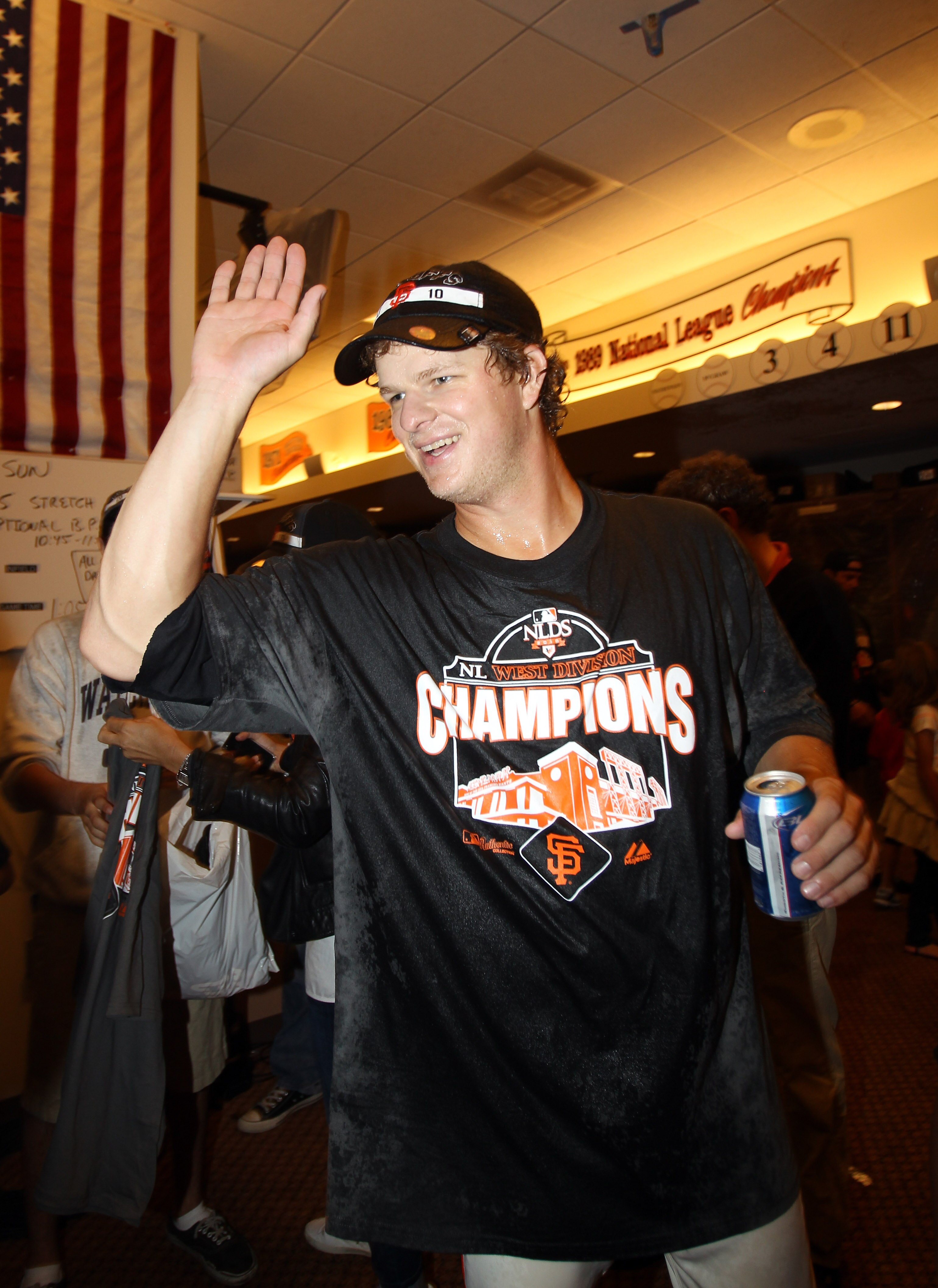 SAN FRANCISCO - OCTOBER 03:  Matt Cain #18 of the San Francisco Giants celebrates in the lockerroom after they beat the San Diego Padres to win the National League West Title at AT&T Park on October 3, 2010 in San Francisco, California.  (Photo by Ezra Sh