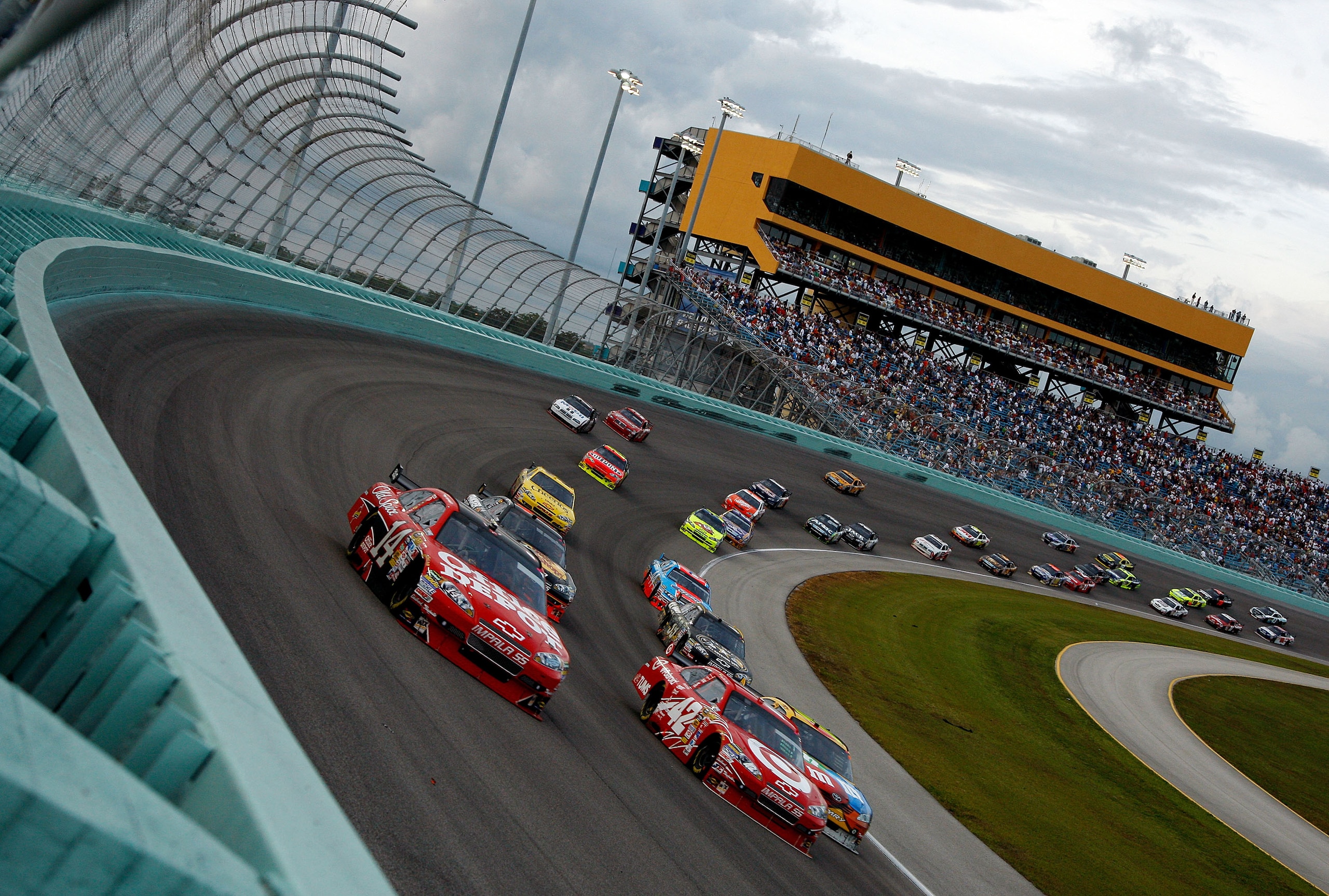 HOMESTEAD, FL - NOVEMBER 22: Tony Stewart, driver of the #14 Office Depot/Old Spice Chevrolet, drives alonside Juan Pablo Montoya, driver of the #42 Target Chevrolet, during the NASCAR Sprint Cup Series Ford 400 at Homestead-Miami Speedway on November 22 HOMESTEAD, FL - NOVEMBER 22: Tony Stewart, driver of the #14 Office Depot/Old Spice Chevrolet, drives alonside Juan Pablo Montoya, driver of the #42 Target Chevrolet, during the NASCAR Sprint Cup Series Ford 400 at Homestead-Miami Speedway on November 22