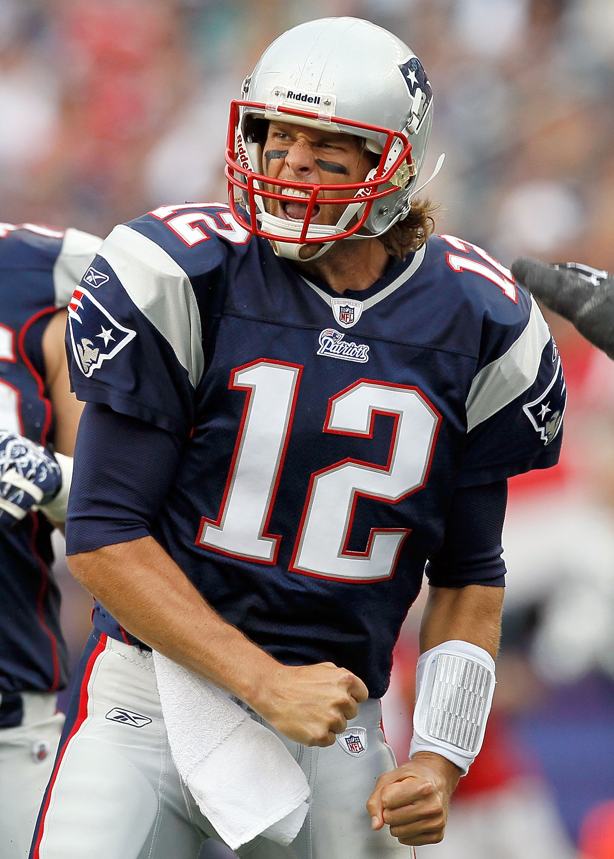 FOXBORO, MA - SEPTEMBER 26:  Tom Brady #12 of the New England Patriots reacts after running the ball for a first down against the Buffalo Bills in the second half at Gillette Stadium on September 26, 2010 in Foxboro, Massachusetts. (Photo by Jim Rogash/Ge