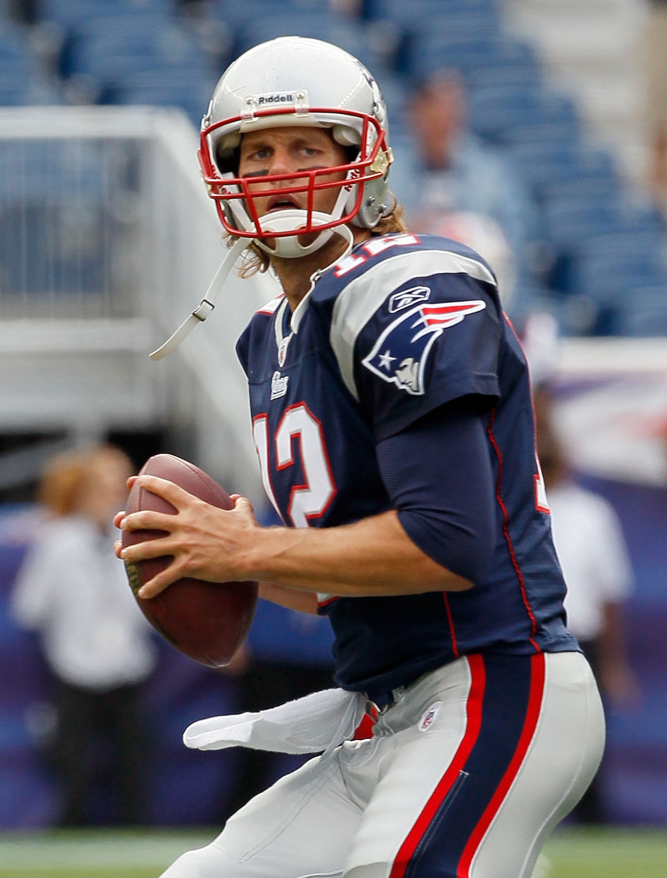 FOXBORO, MA - SEPTEMBER 26:  Tom Brady #12 of the New England Patriots participates in drills before a game against the Buffalo Bills at Gillette Stadium on September 26, 2010 in Foxboro, Massachusetts. (Photo by Jim Rogash/Getty Images)