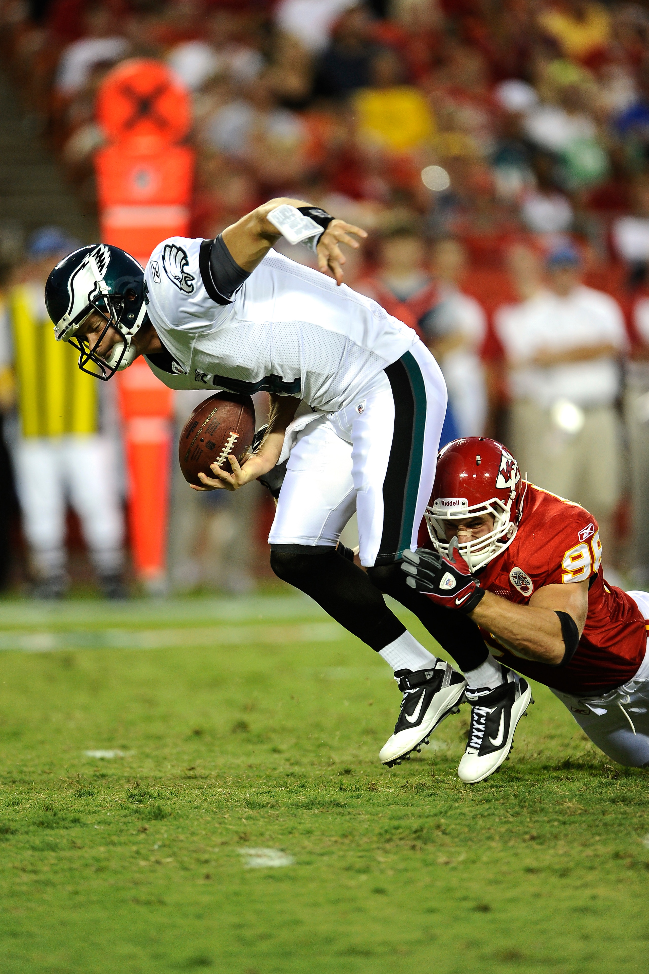 KANSAS CITY, MO - AUGUST 27: Andy Studebaker #96 of the Kansas City Chiefs sacks Kevin Kolb #4 of the Philadelphia Eagles during a preseason game at Arrowhead Stadium on August 27, 2010 in Kansas City, Missouri.  (Photo by G. Newman Lowrance/Getty Images)