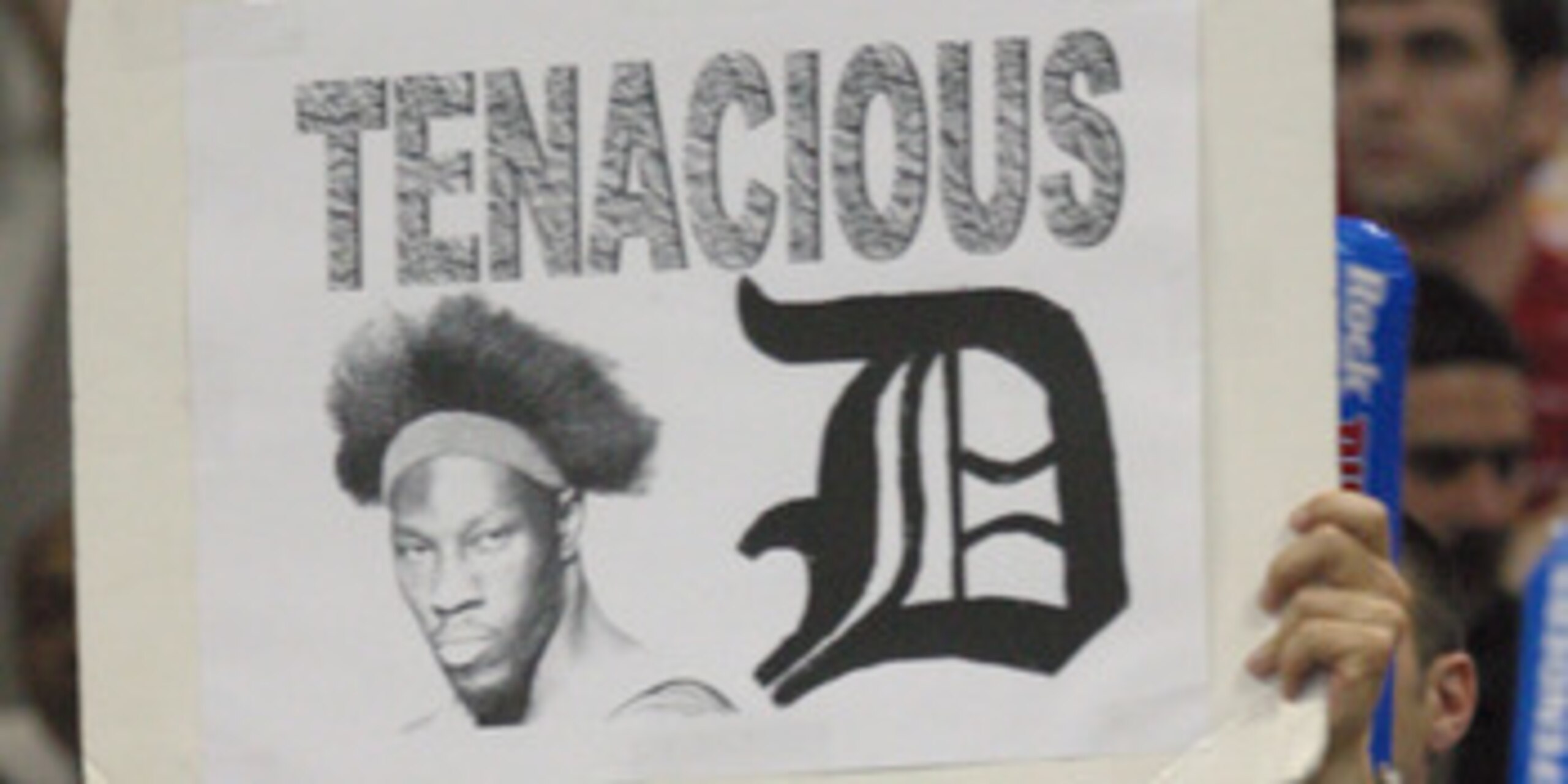 AUBURN HILLS, MI - JUNE 4:  A fan of the Detroit Pistons holds up a sign that reads 'Tenacious D' against the Miami Heat in Game Six of the Eastern Conference Finals during the 2005 NBA Playoffs June 4, 2005 at the Palace At Auburn Hills in Auburn Hills,