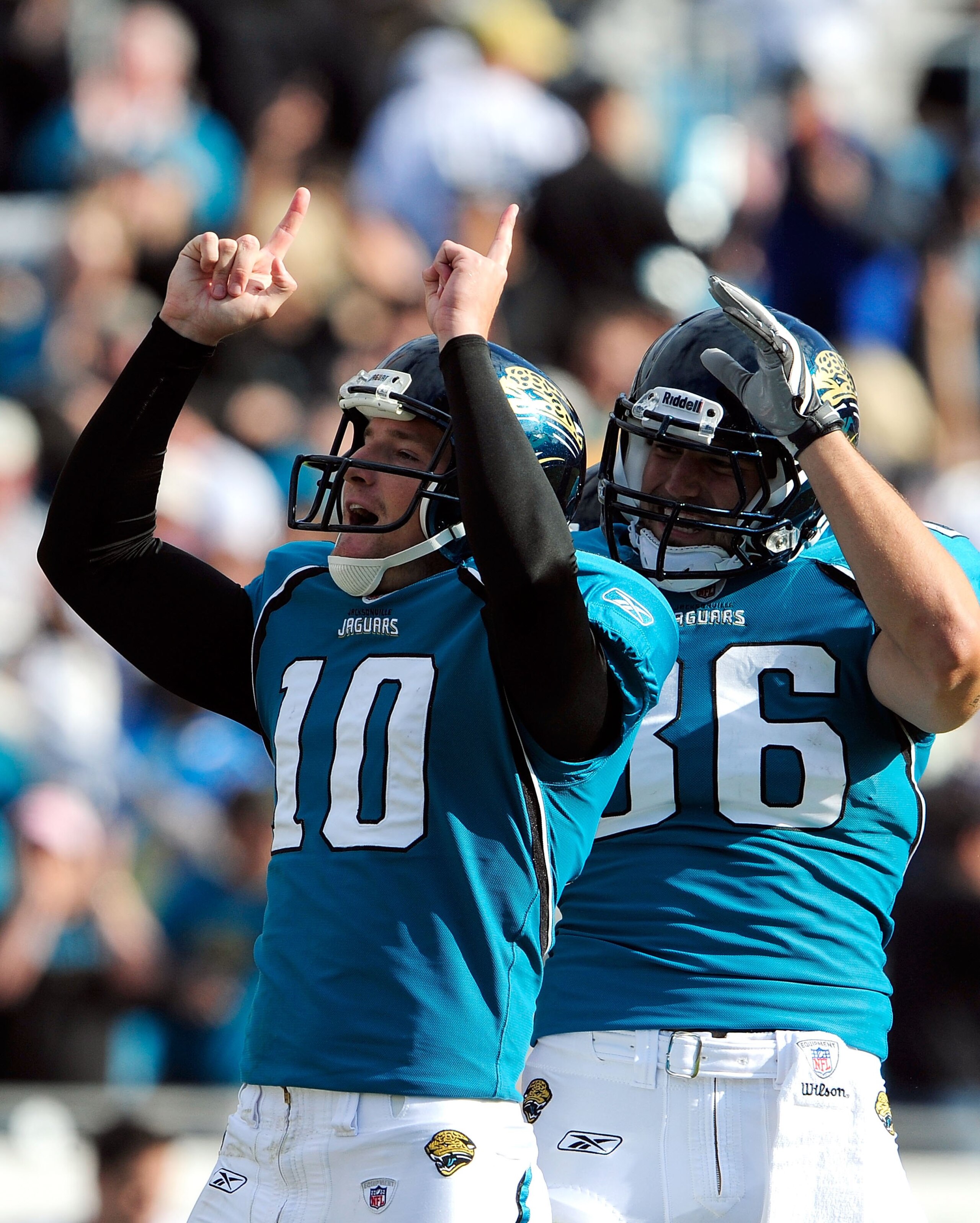 JACKSONVILLE, FL - OCTOBER 18:  Josh Scobee #10 and Zach Miller #86 of the Jacksonville Jaguars celebrate after Scobee kicks a winning field goal in overtime against the St. Louis Rams at Jacksonville Municipal Stadium on October 18, 2009 in Jacksonville,