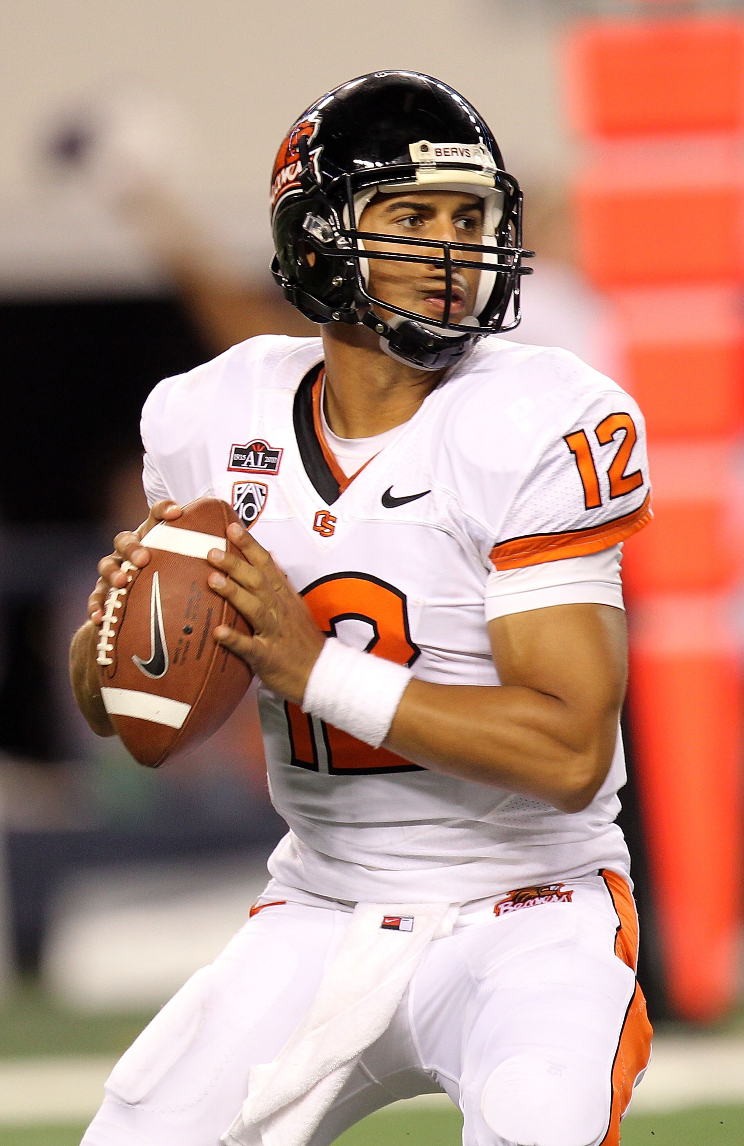 ARLINGTON, TX - SEPTEMBER 04:  Quarterback Ryan Katz #12 of the Oregon State Beavers drops back to pass against the TCU Horned Frogs at Cowboys Stadium on September 4, 2010 in Arlington, Texas.  (Photo by Ronald Martinez/Getty Images)