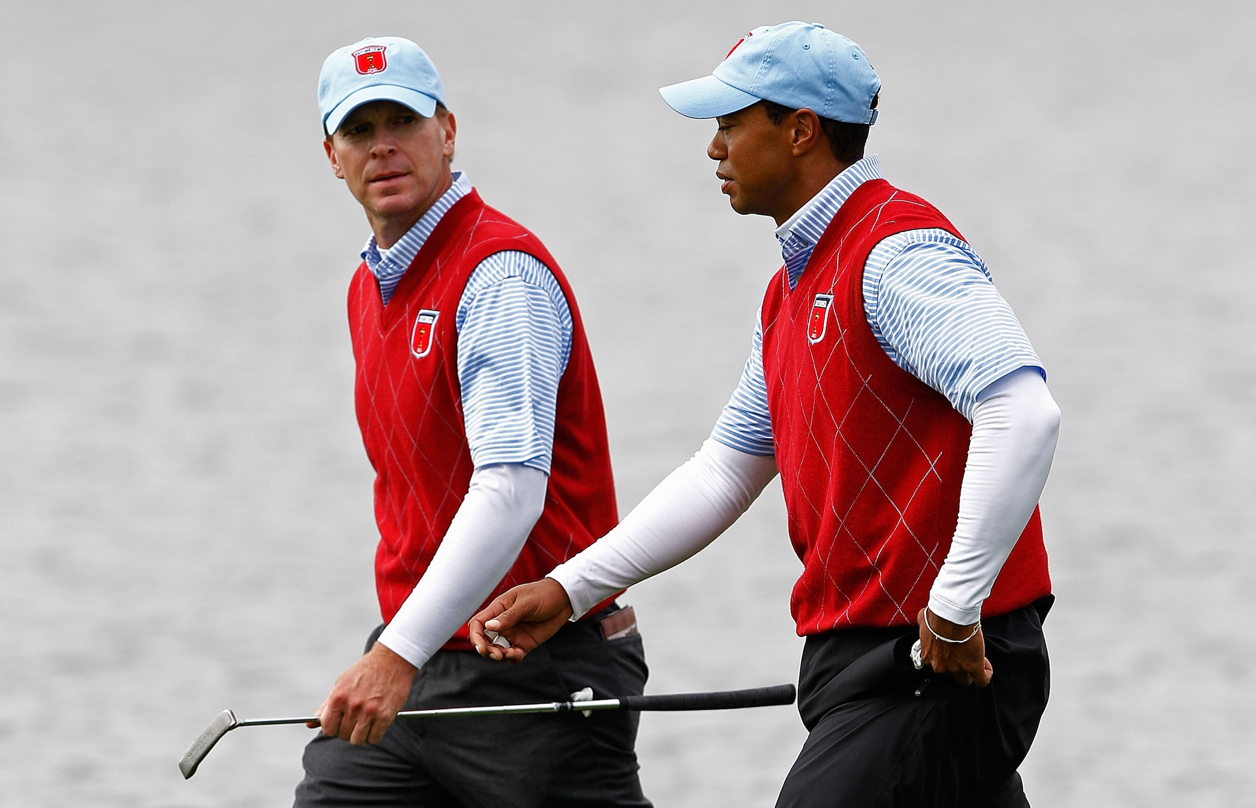 NEWPORT, WALES - OCTOBER 03:  Tiger Woods of the USA chats with team mate Steve Stricker (L) on the 13th hole during the Fourball & Foursome Matches during the 2010 Ryder Cup at the Celtic Manor Resort on October 3, 2010 in Newport, Wales.  (Photo by Sam 