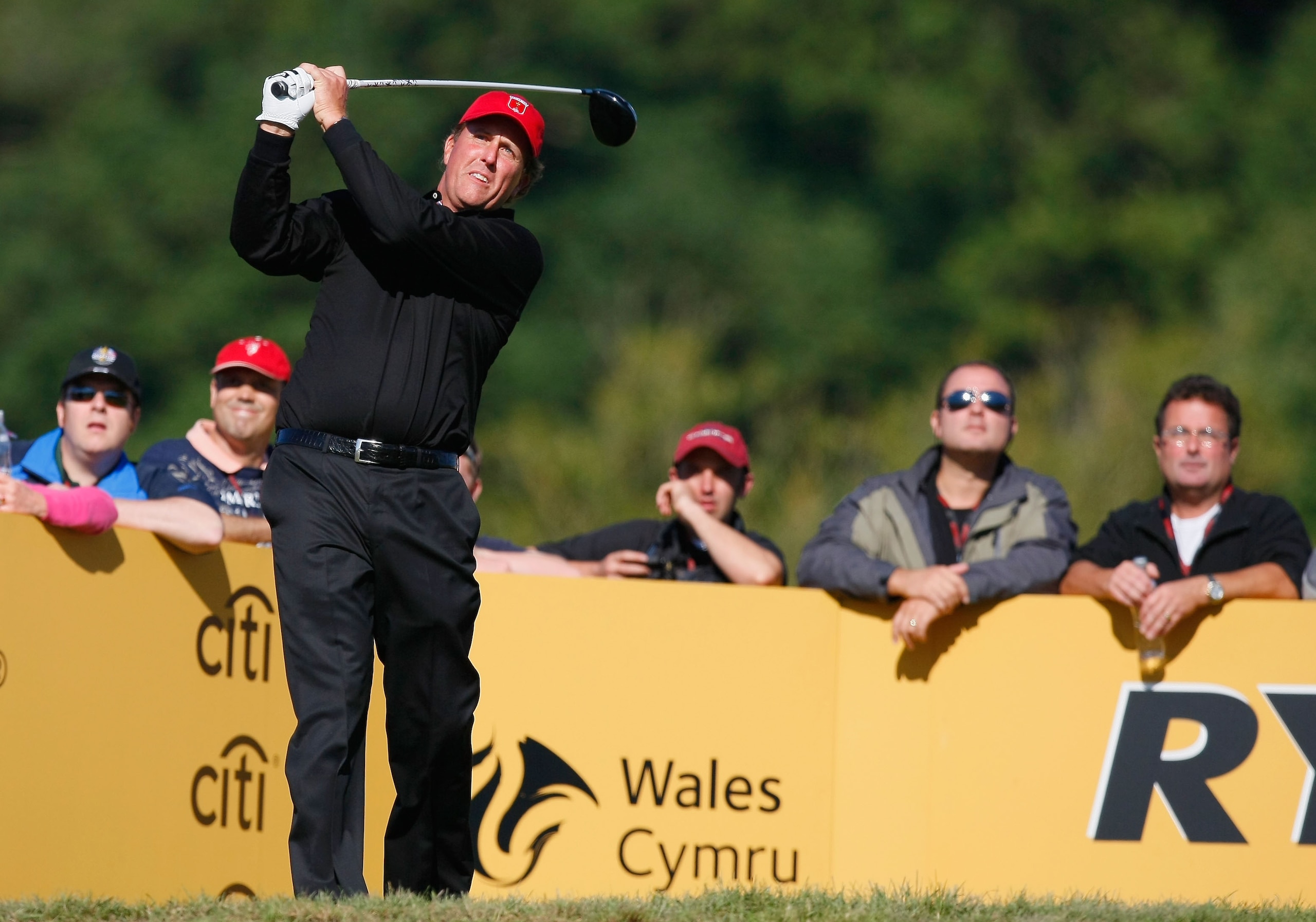 NEWPORT, WALES - OCTOBER 04:  Phil Mickelson of the USA tees off in the singles matches during the 2010 Ryder Cup at the Celtic Manor Resort on October 4, 2010 in Newport, Wales.  (Photo by Tom Dulat/Getty Images)