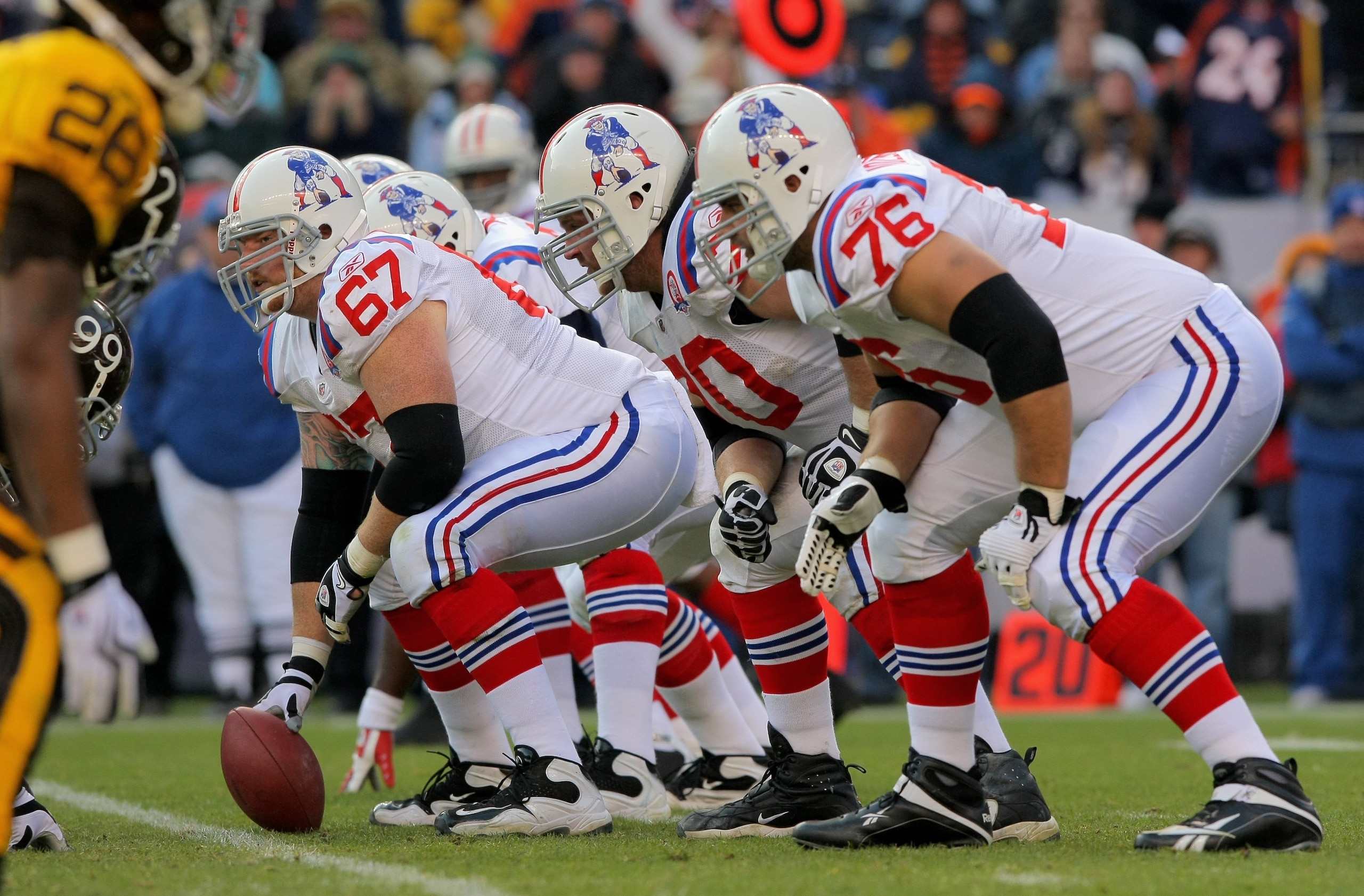 DENVER - OCTOBER 11: Center Dan Koppen #67 of the New England Patriots prepares to snap the ball as the offensive line readies for pass protection against the Denver Broncos during NFL action at Invesco Field at Mile High on October 11, 2009 in Denver, C DENVER - OCTOBER 11: Center Dan Koppen #67 of the New England Patriots prepares to snap the ball as the offensive line readies for pass protection against the Denver Broncos during NFL action at Invesco Field at Mile High on October 11, 2009 in Denver, C