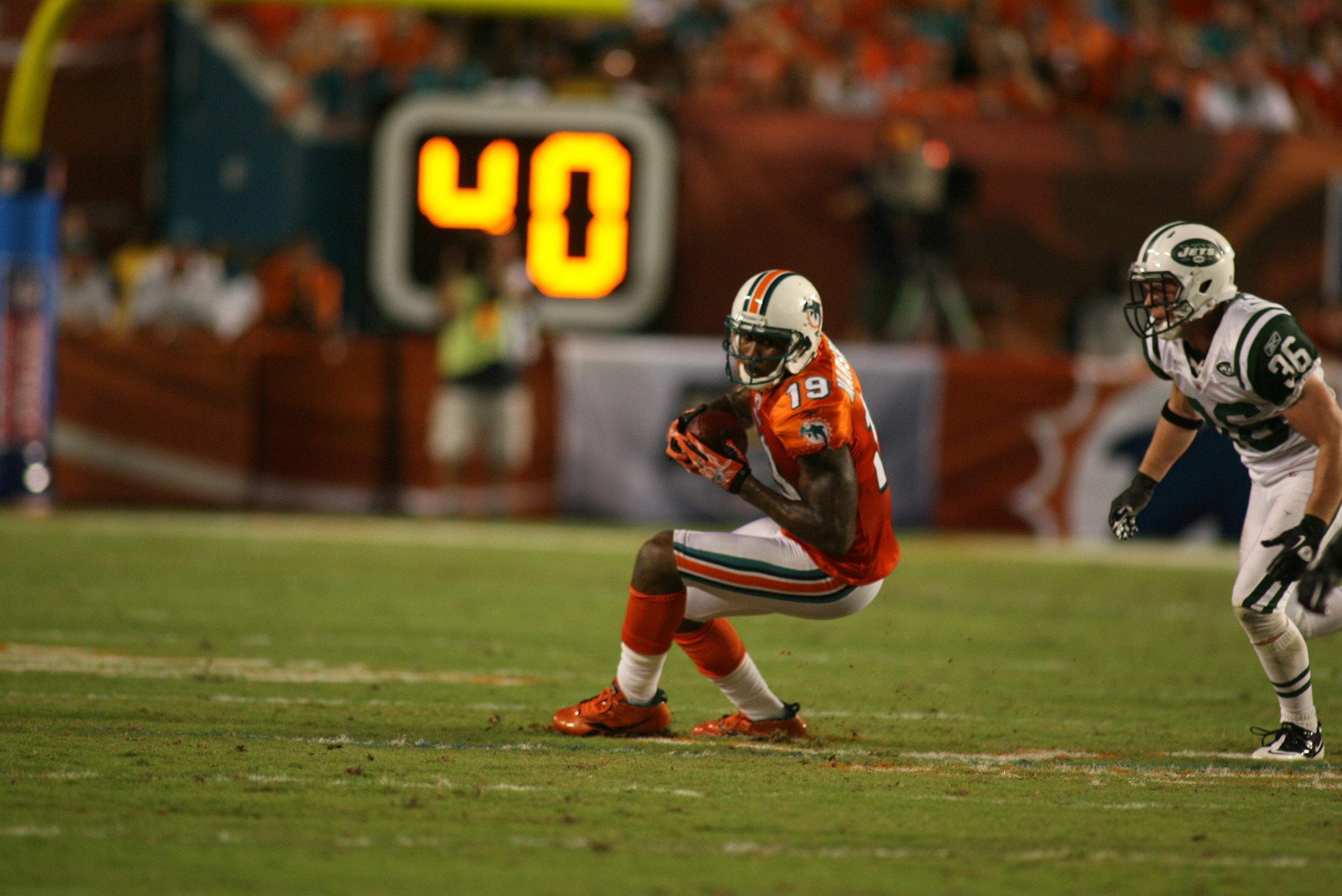 MIAMI - SEPTEMBER 26: Receiver Brandon Marshall #19 of the Miami Dolphins makes a catch against the New York Jets at Sun Life Stadium on September 26, 2010 in Miami, Florida. The Jets won 31-23. (Photo by Marc Serota/Getty Images) MIAMI - SEPTEMBER 26: Receiver Brandon Marshall #19 of the Miami Dolphins makes a catch against the New York Jets at Sun Life Stadium on September 26, 2010 in Miami, Florida. The Jets won 31-23. (Photo by Marc Serota/Getty Images)