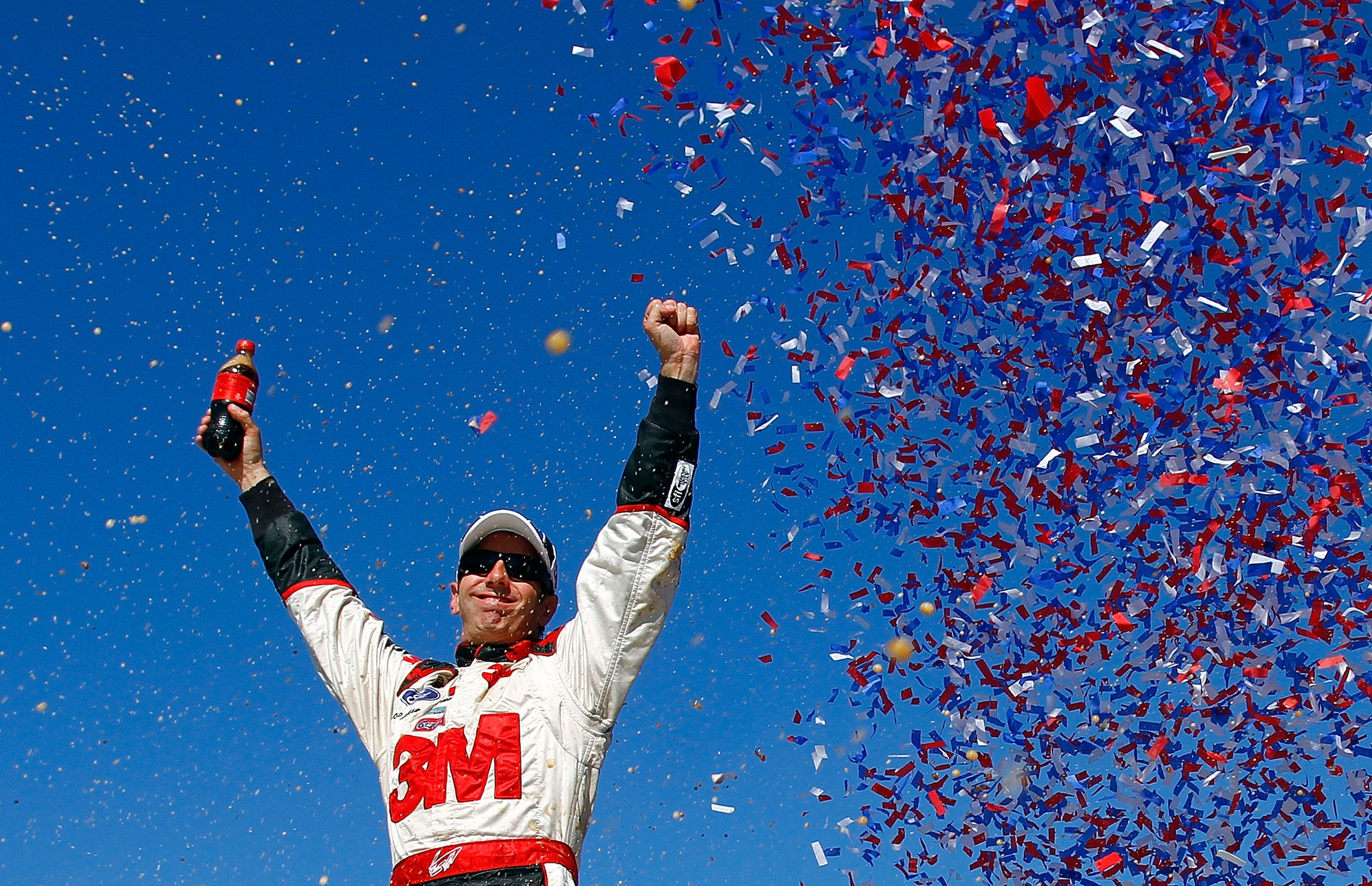 KANSAS CITY, KS - OCTOBER 03:  Greg Biffle, driver of the #16 3M Ford, celebrates in victory lane after winning the NASCAR Sprint Cup Series Price Chopper 400 on October 3, 2010 in Kansas City, Kansas.  (Photo by Jason Smith/Getty Images for NASCAR)