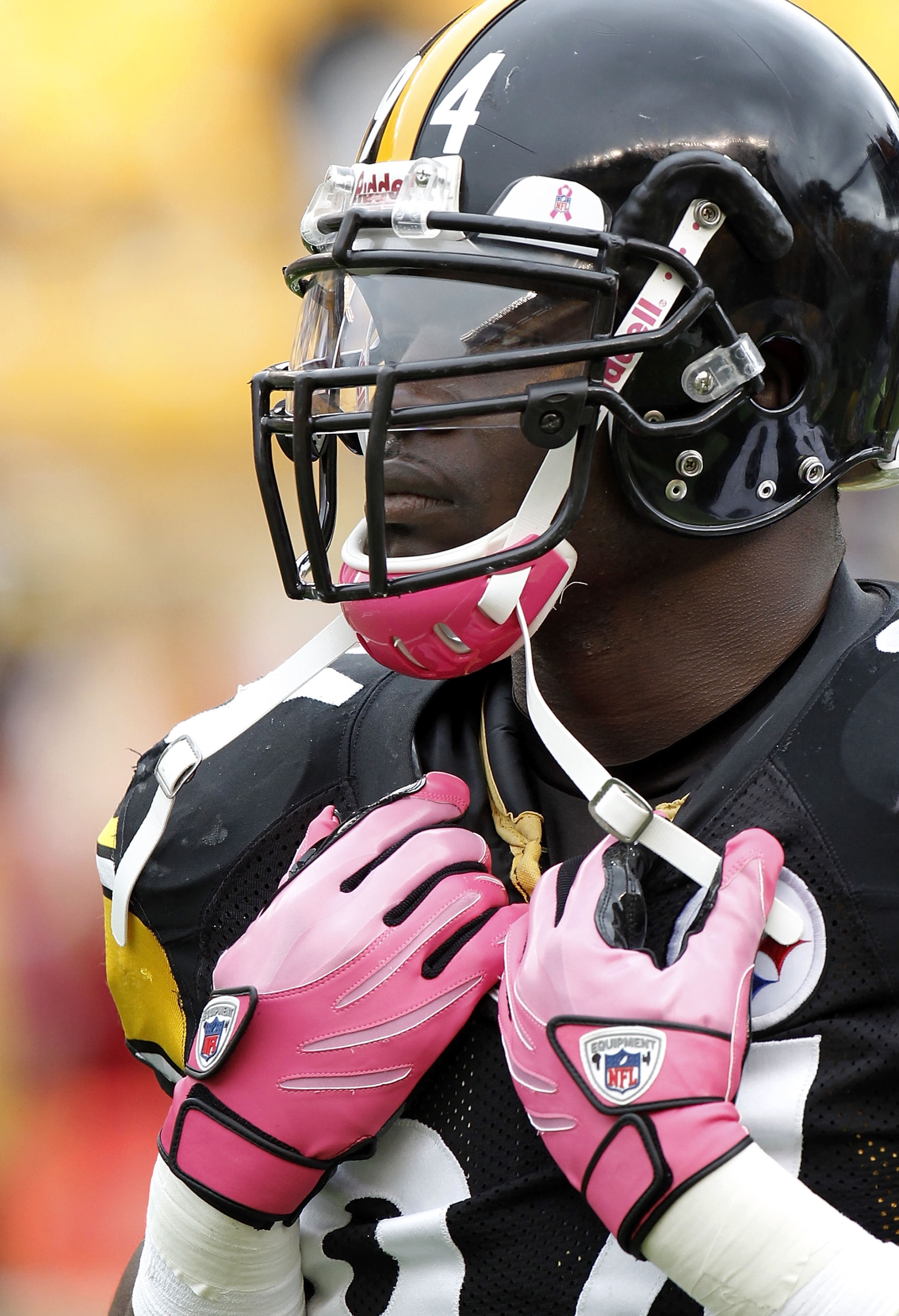 PITTSBURGH - OCTOBER 03:  Lawrence Timmons #94 of the Pittsburgh Steelers wears a pink chin strap and gloves for breast cancer awareness prior to playing the Baltimore Ravens on October 3, 2010 at Heinz Field in Pittsburgh, Pennsylvania.  (Photo by Gregor