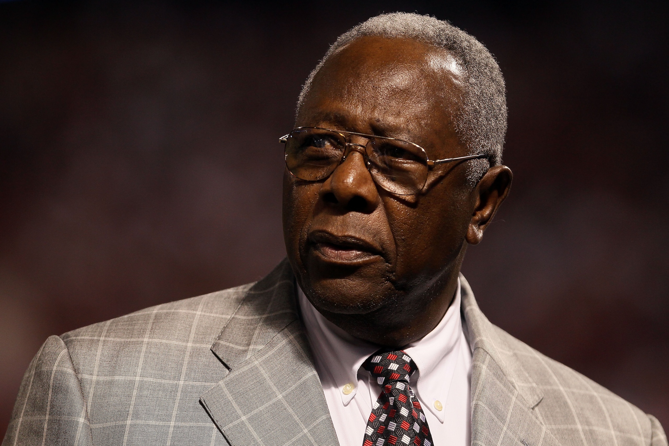 ARLINGTON, TX - OCTOBER 31:  Baseball Hall of Famer Hank Aaron looks on prior to the Texas Rangers playing against the San Francisco Giants in Game Four of the 2010 MLB World Series at Rangers Ballpark in Arlington on October 31, 2010 in Arlington, Texas.
