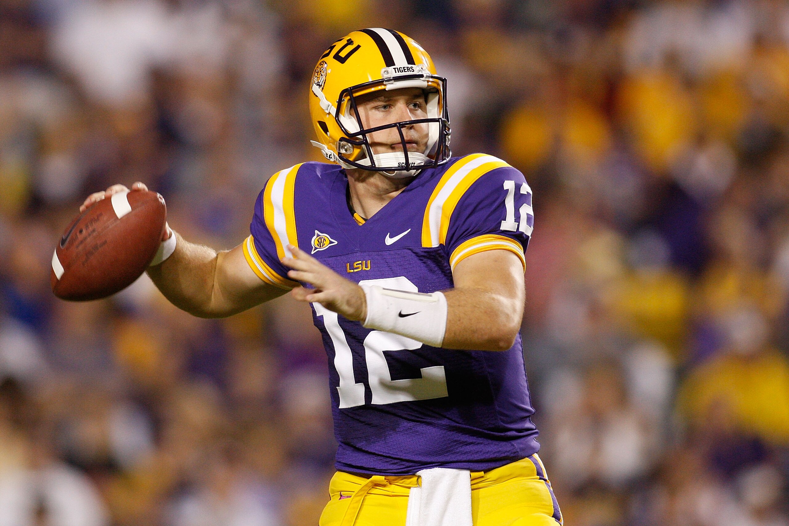 BATON ROUGE, LA - NOVEMBER 14:  Quarterback Jarrett Lee #12 of the LSU Tigers looks to pass the ball against the Louisiana Tech Bulldogs at Tiger Stadium on November 14, 2009 in Baton Rouge, Louisiana.  (Photo by Chris Graythen/Getty Images)
