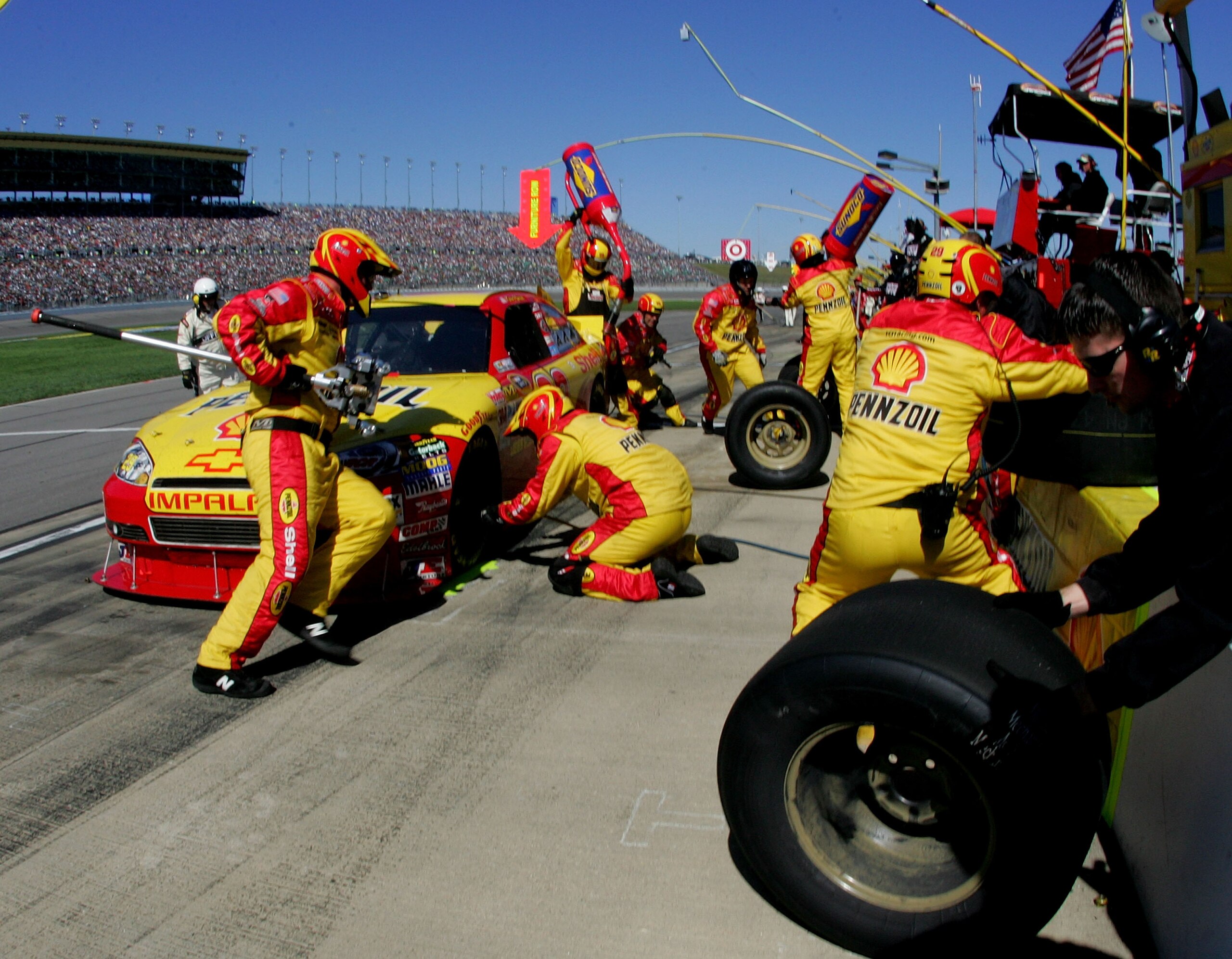 KANSAS CITY, KS - OCTOBER 03:  Kevin Harvick, driver of the #29 Shell/Pennzoil Chevrolet, makes a pit stop during the NASCAR Sprint Cup Series Price Chopper 400 on October 3, 2010 in Kansas City, Kansas.  (Photo by Jerry Markland/Getty Images for NASCAR)
