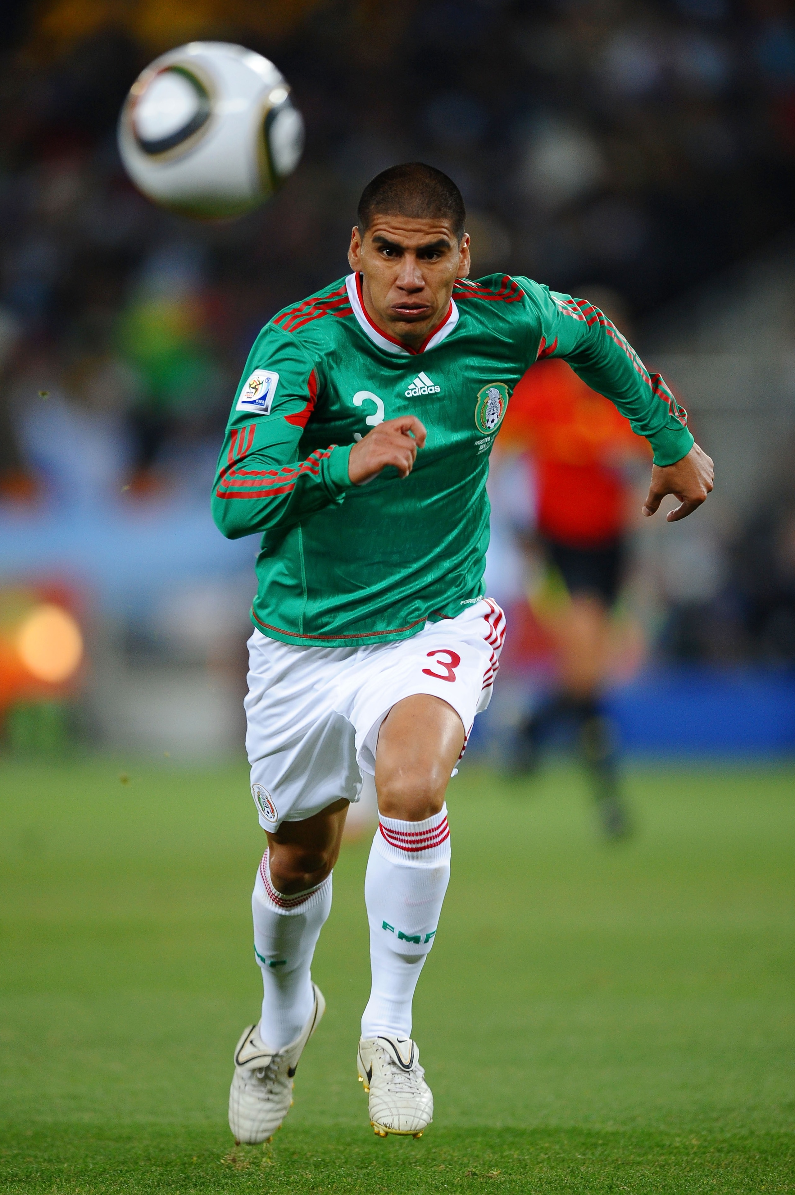 JOHANNESBURG, SOUTH AFRICA - JUNE 27:  Carlos Salcido of Mexico runs for the ball during the 2010 FIFA World Cup South Africa Round of Sixteen match between Argentina and Mexico at Soccer City Stadium on June 27, 2010 in Johannesburg, South Africa.  (Phot