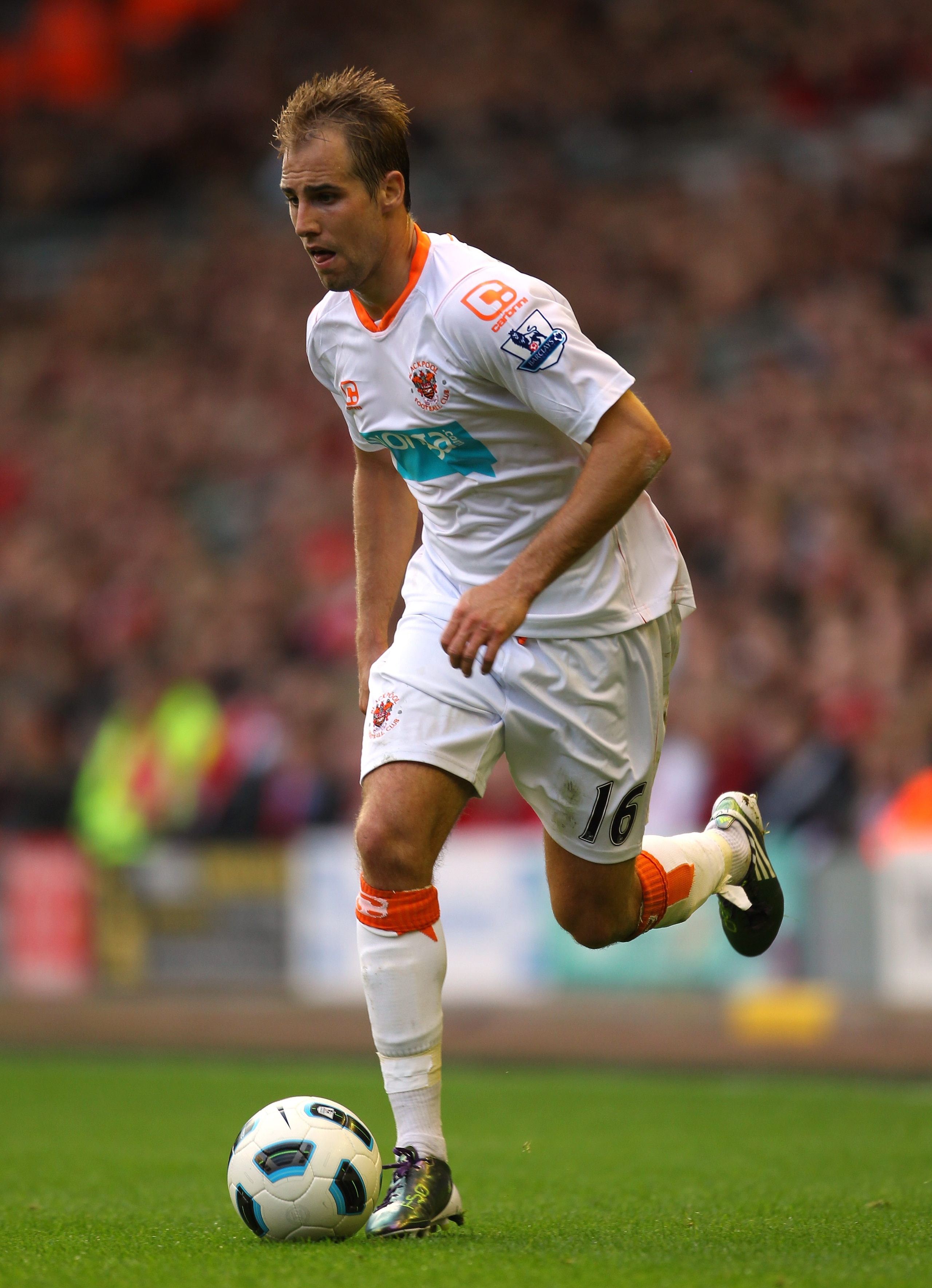 LIVERPOOL, ENGLAND - OCTOBER 03:  Luke Varney of Blackpool runs with the ball during the Barclays Premier League match between Liverpool and Blackpool at Anfield on October 3, 2010 in Liverpool, England.  (Photo by Alex Livesey/Getty Images)