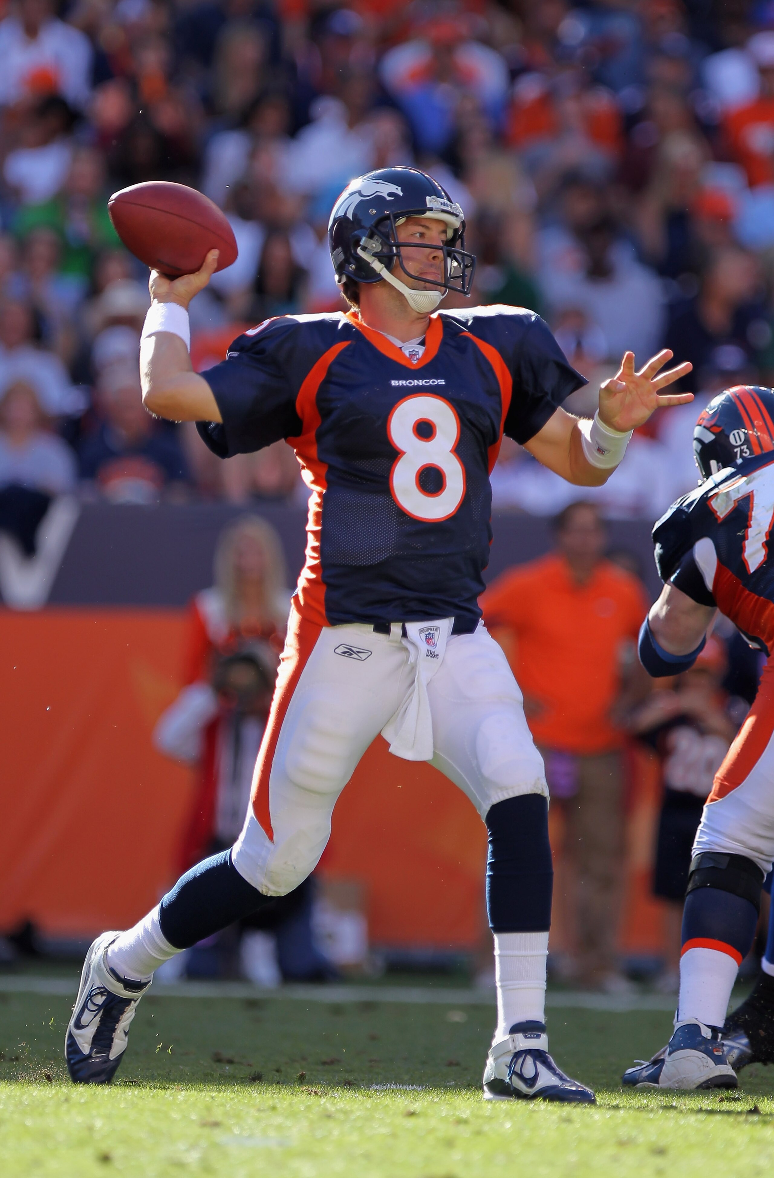 DENVER - SEPTEMBER 26:  Quarterback Kyle Orton #8 of the Denver Broncos delivers a pass against the Indianapolis Colts at INVESCO Field at Mile High on September 26, 2010 in Denver, Colorado. Orton passed for 476 yards as the Colts defeated the Broncos 27