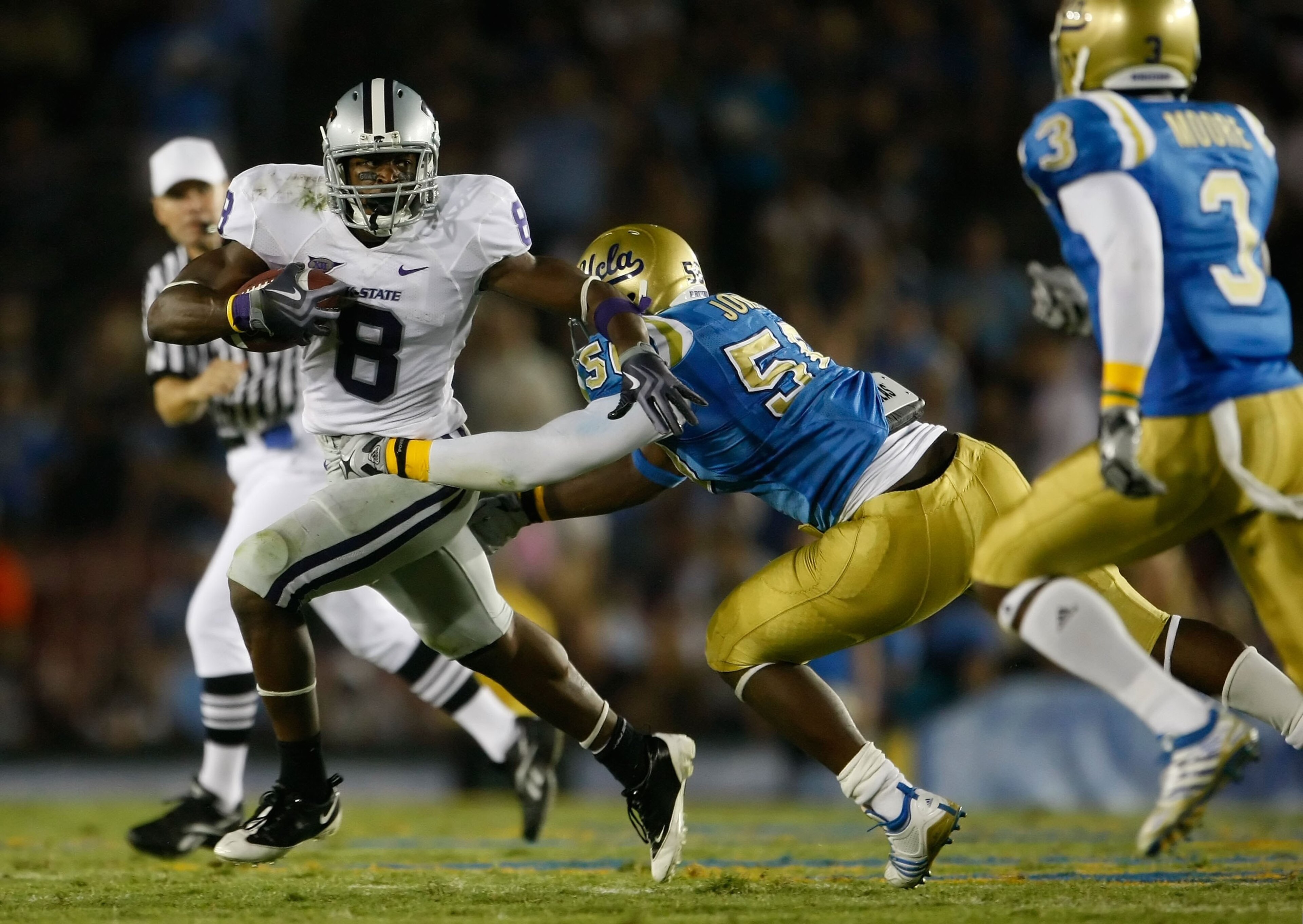 PASADENA, CA - SEPTEMBER 19: Runningback Daniel Thomas #8 of the Kansas State Wildcats carries the ball against the UCLA Bruins at the Rose Bowl on September 19, 2009 in Pasadena, California. UCLA defeated Kansas State 23-9. (Photo by Jeff Gross/Getty I PASADENA, CA - SEPTEMBER 19: Runningback Daniel Thomas #8 of the Kansas State Wildcats carries the ball against the UCLA Bruins at the Rose Bowl on September 19, 2009 in Pasadena, California. UCLA defeated Kansas State 23-9. (Photo by Jeff Gross/Getty I