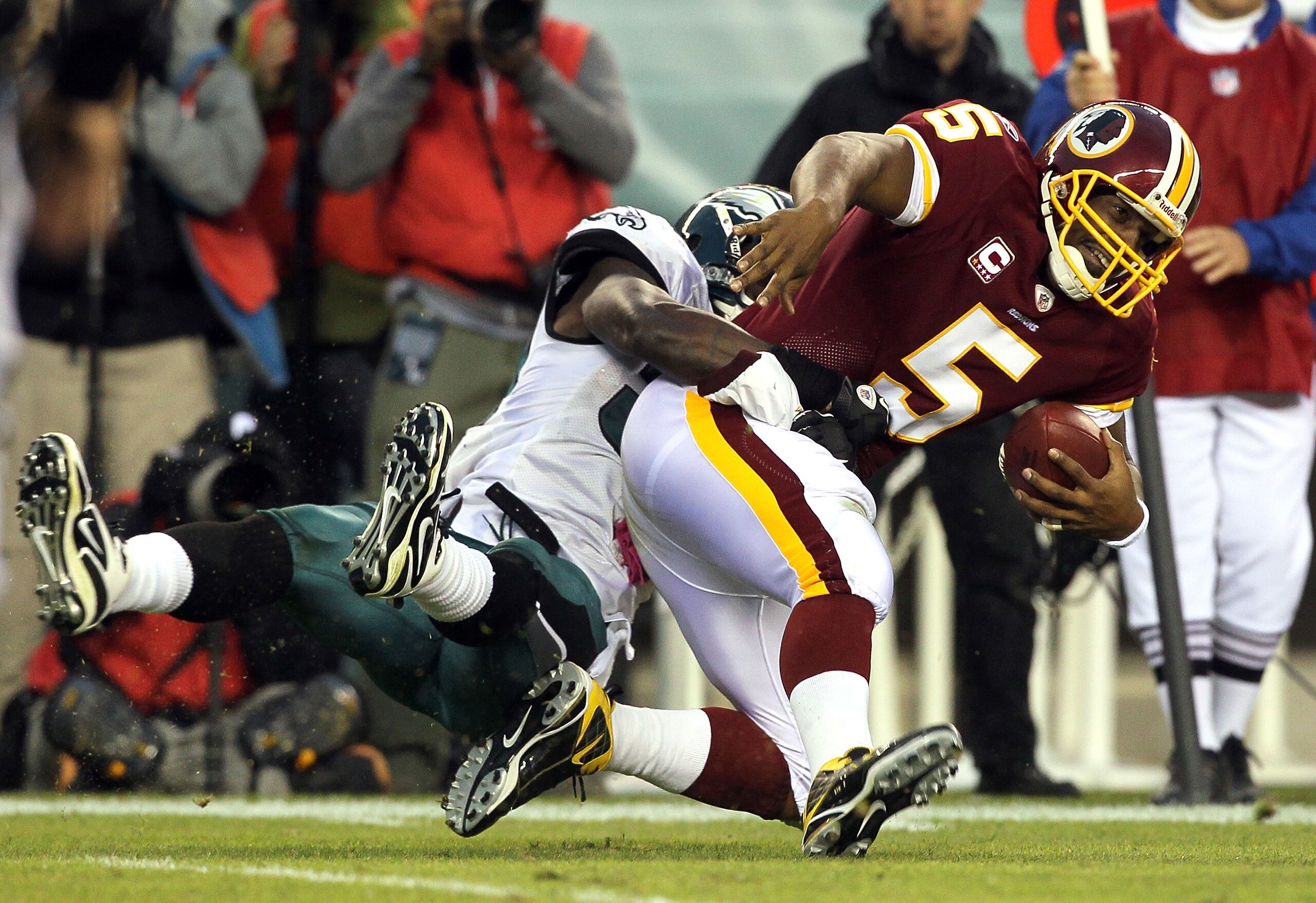 PHILADELPHIA - OCTOBER 03:  Donovan McNabb #5 of the Washington Redskins is sacked by Ernie Sims #50 of the Philadelphia Eagles on October 3, 2010 at Lincoln Financial Field in Philadelphia, Pennsylvania. The Redskins defeated the Eagles 17-12.  (Photo by