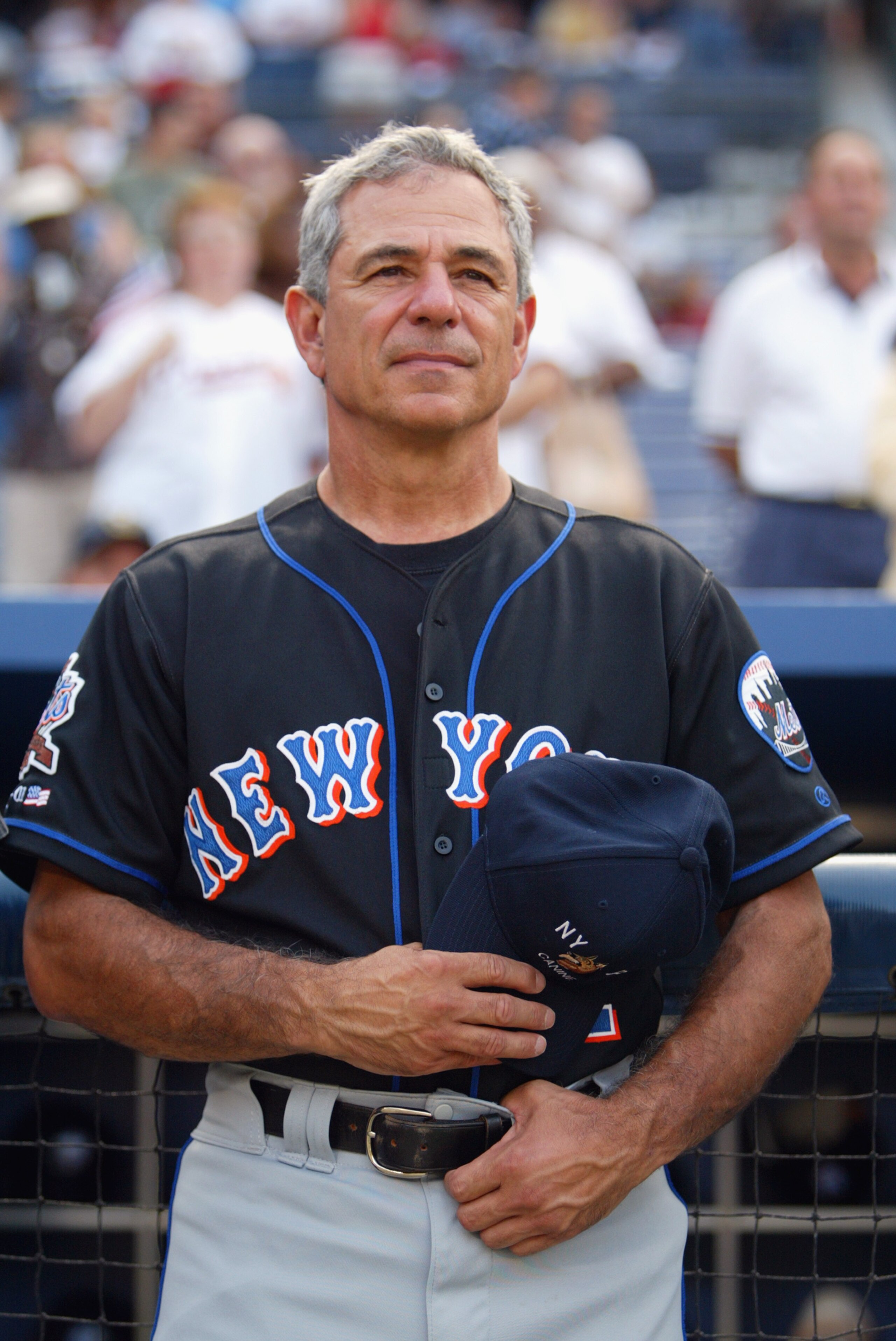 ATLANTA - SEPTEMBER 11:  Manager Bobby Valentine #2 of the New York Mets holds his NYPD hat over his heart during the national anthem before the second game of a MLB double-header against the Atlanta Braves on September 11, 2002 at Turner Field in Atlanta