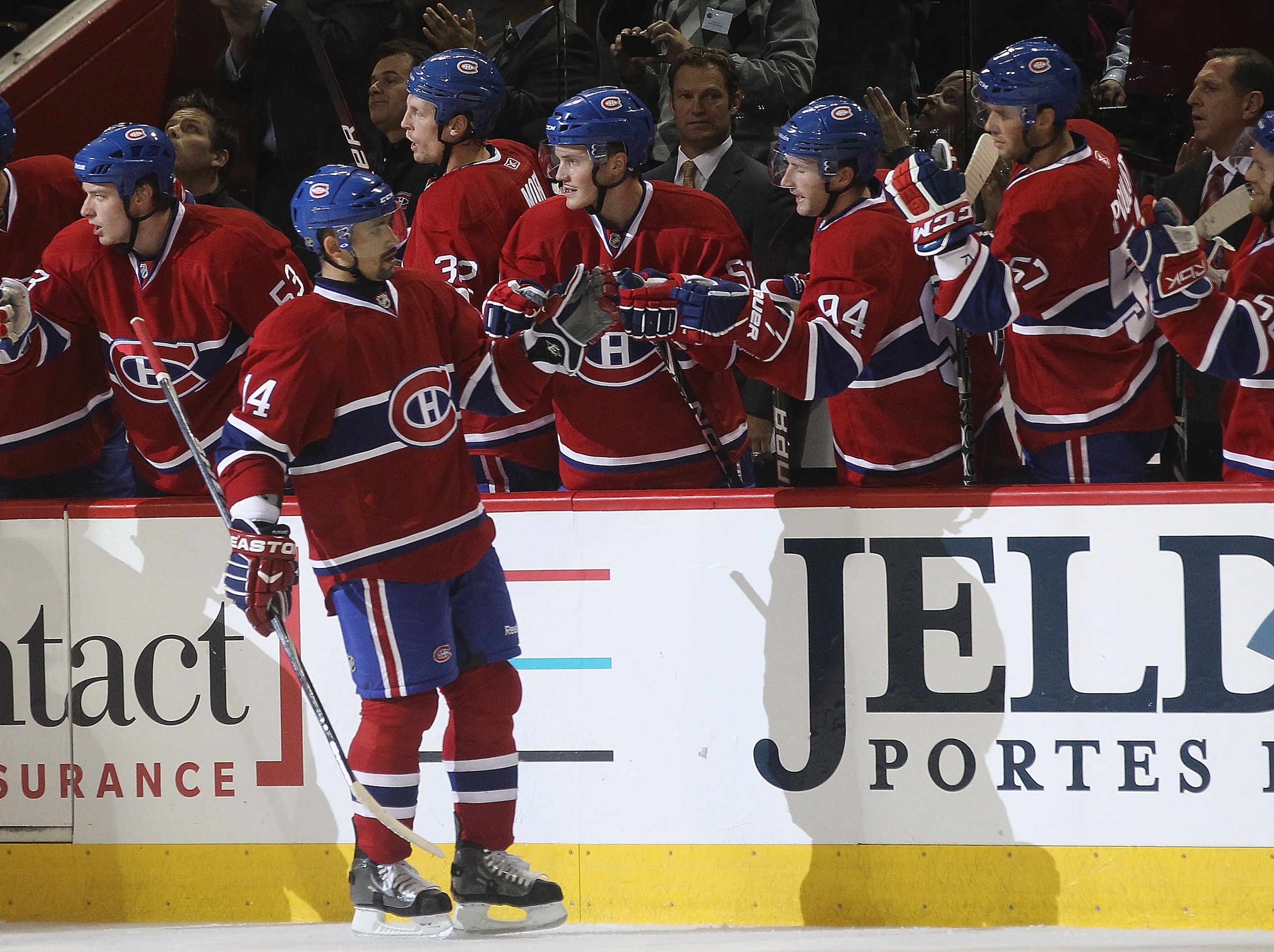 MONTREAL, QC - SEPTEMBER 27: Tomas Plekanec #14 of the Montreal Canadiens returns to the bench after scoring his first period shorthanded goal against the Florida Panthers at the Bell Centre on September 27, 2010 in Montreal, Canada.  (Photo by Bruce Benn