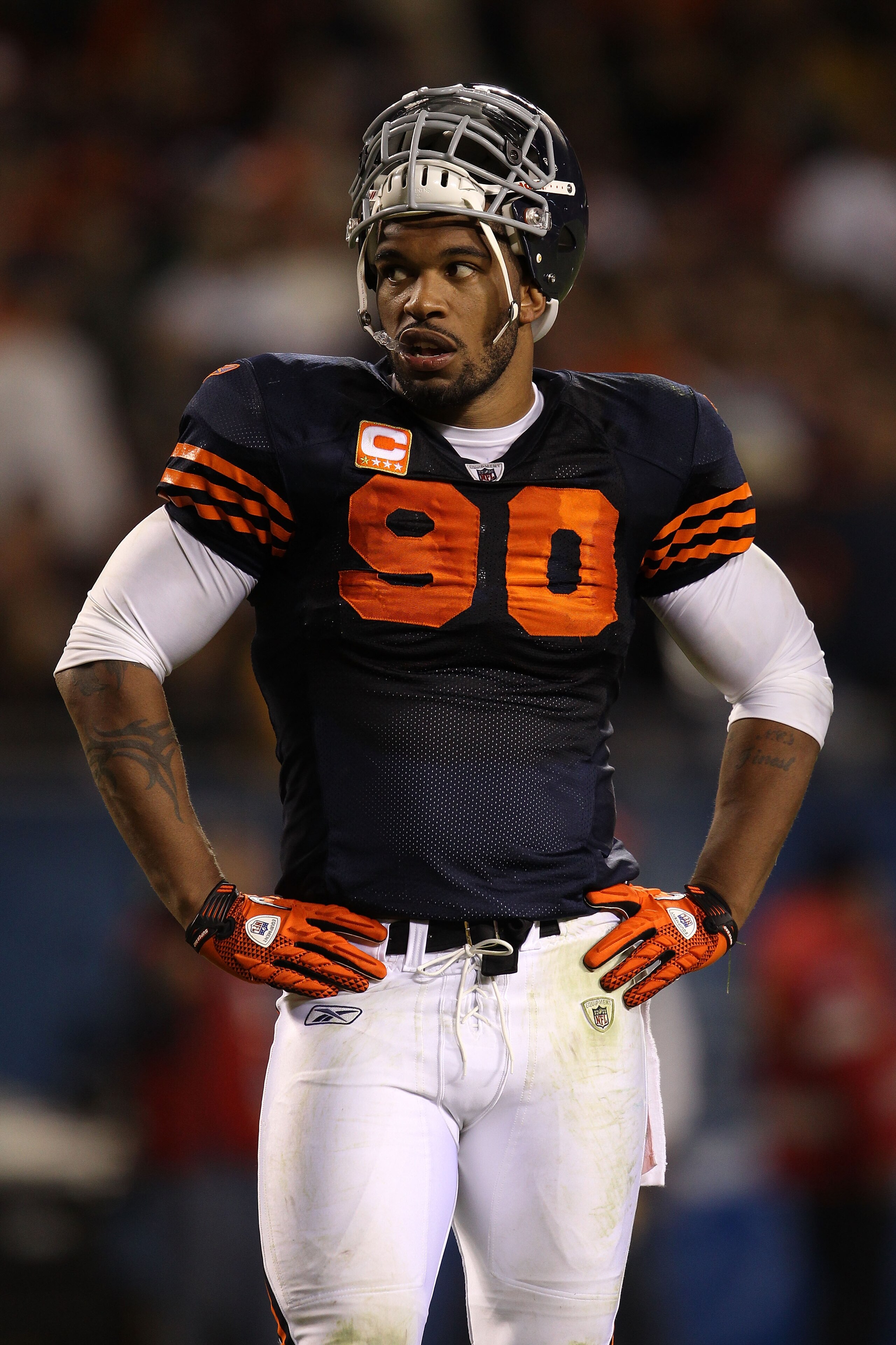 CHICAGO - SEPTEMBER 27: Julius Peppers #90 of the Chicago Bears looks on against the Green Bay Packers at Soldier Field on September 27, 2010 in Chicago, Illinois. (Photo by Jonathan Daniel/Getty Images) CHICAGO - SEPTEMBER 27: Julius Peppers #90 of the Chicago Bears looks on against the Green Bay Packers at Soldier Field on September 27, 2010 in Chicago, Illinois. (Photo by Jonathan Daniel/Getty Images)