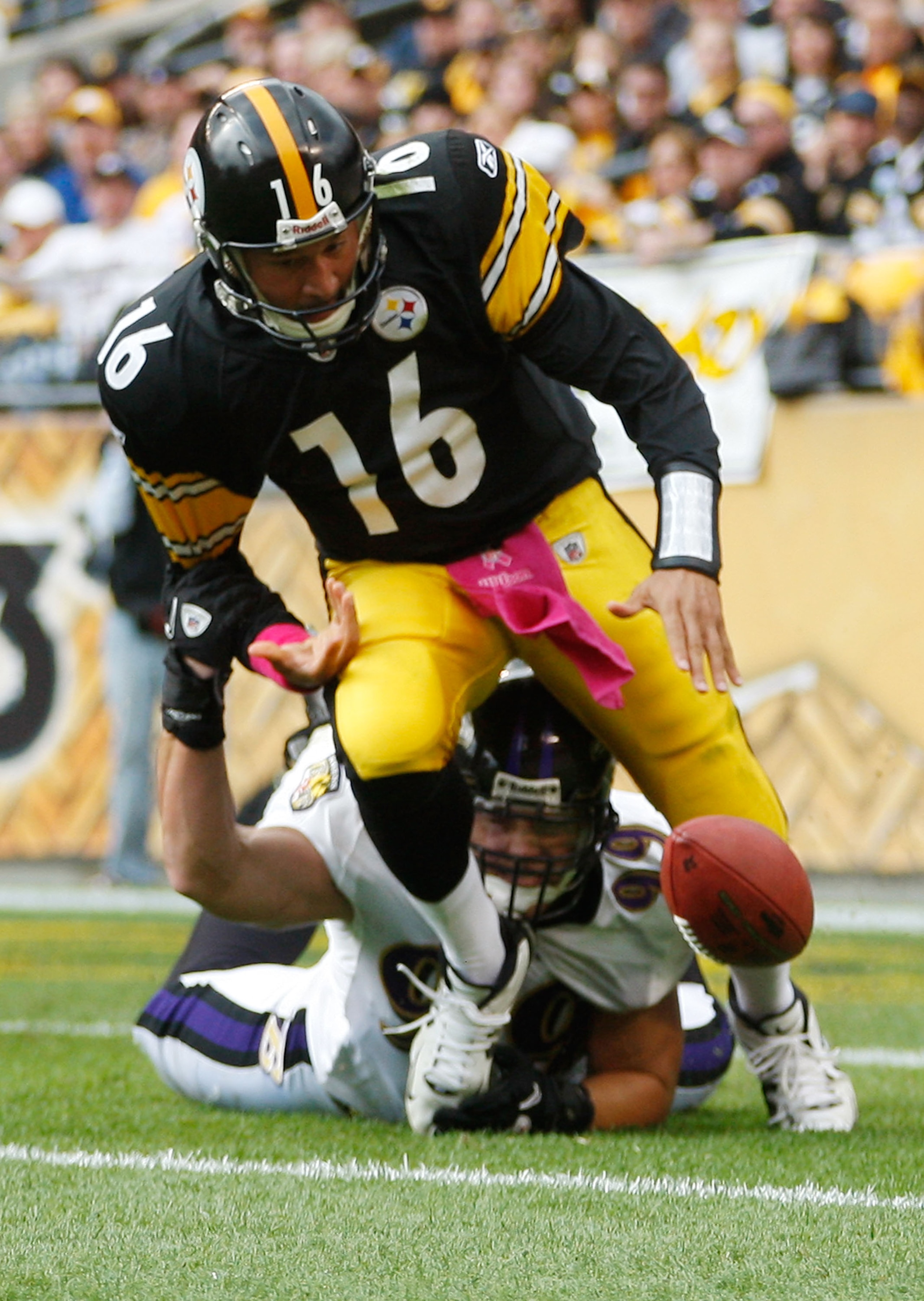 PITTSBURGH - OCTOBER 03:  Charlie Batch #16 of the Pittsburgh Steelers has the ball stripped by Paul Kruger #99 of the Baltimore Ravens during the game on October 3, 2010 at Heinz Field in Pittsburgh, Pennsylvania.  (Photo by Jared Wickerham/Getty Images)