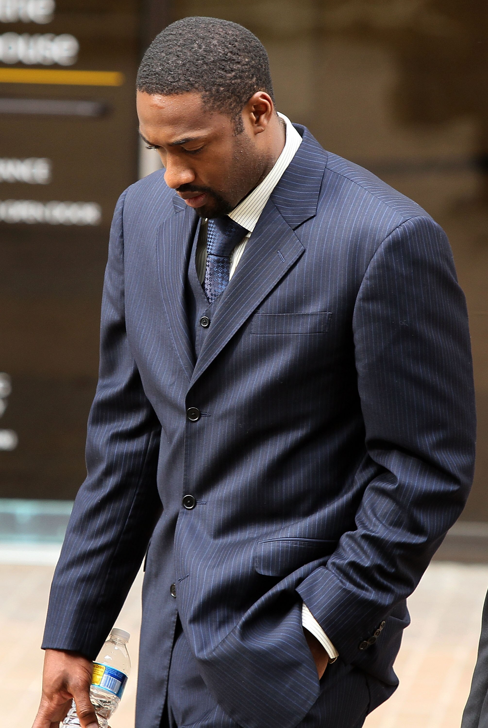 WASHINGTON - MARCH 26: NBA player Gilbert Arenas of the Washington Wizards leaves the District of Columbia Court after being sentenced March 26, 2010 in Washington, DC. The Washington Wizards star recieved two years probation for bringing guns into the W WASHINGTON - MARCH 26: NBA player Gilbert Arenas of the Washington Wizards leaves the District of Columbia Court after being sentenced March 26, 2010 in Washington, DC. The Washington Wizards star recieved two years probation for bringing guns into the W