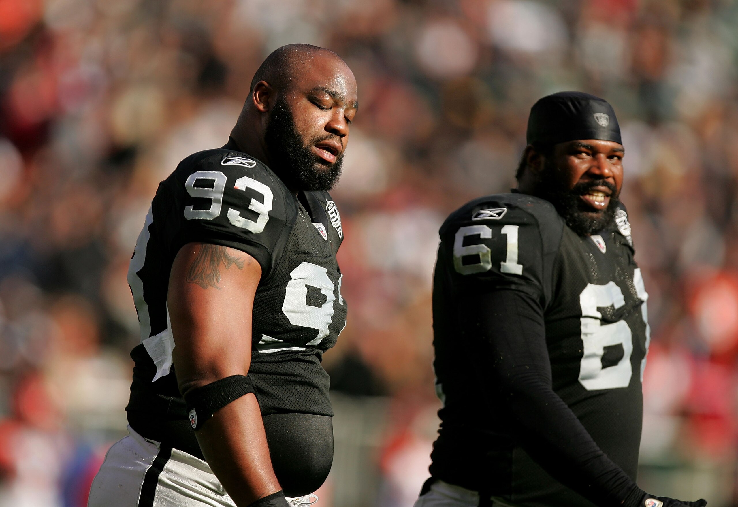 OAKLAND, CA - NOVEMBER 22: Tommy Kelly #93 and Gerard Warren #61 of the Oakland Raiders react after the Cincinnati Bengals scored a touchdown at Oakland-Alameda County Coliseum on November 22, 2009 in Oakland, California. (Photo by Ezra Shaw/Getty Image OAKLAND, CA - NOVEMBER 22: Tommy Kelly #93 and Gerard Warren #61 of the Oakland Raiders react after the Cincinnati Bengals scored a touchdown at Oakland-Alameda County Coliseum on November 22, 2009 in Oakland, California. (Photo by Ezra Shaw/Getty Image