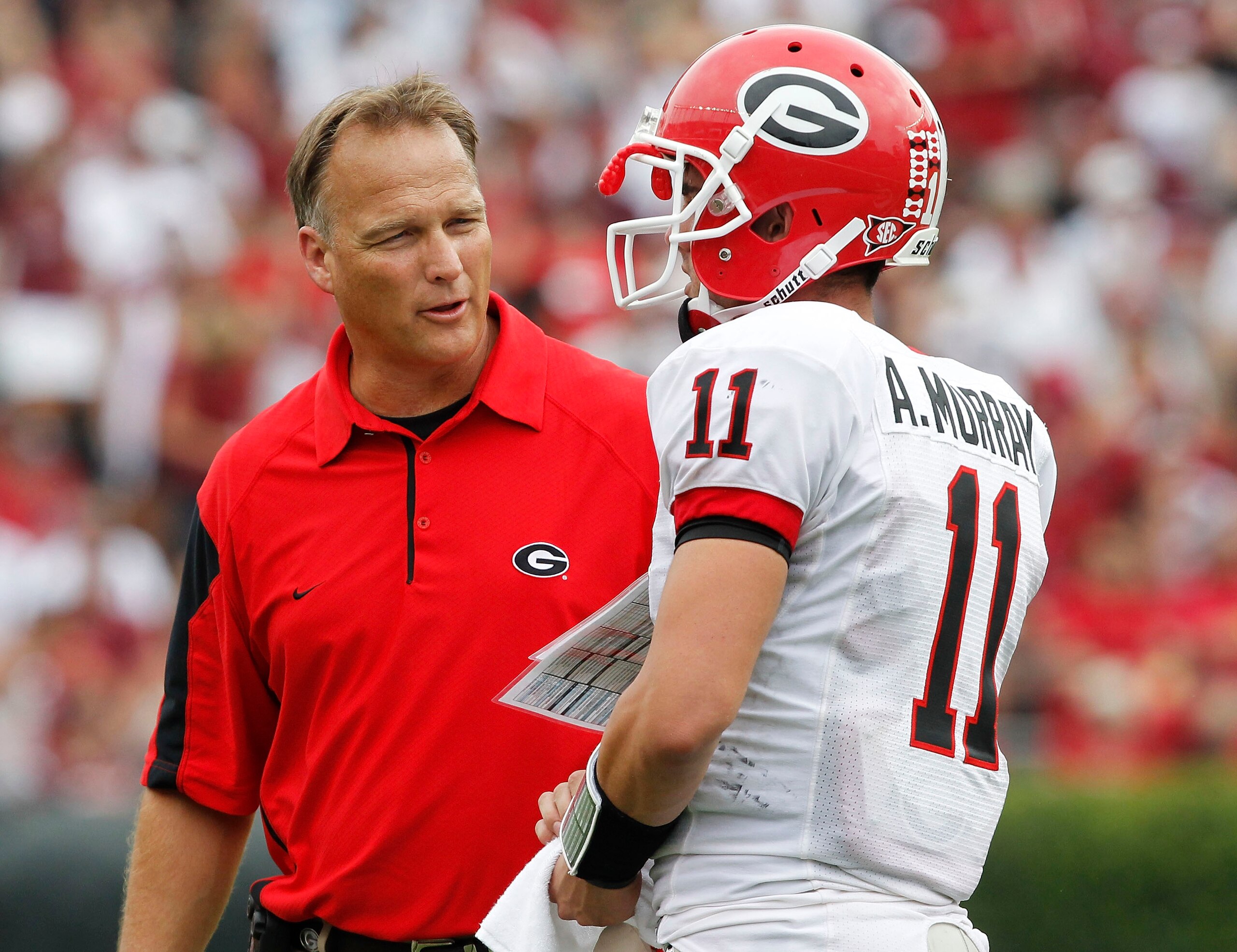 COLUMBIA, SC - SEPTEMBER 11: Head coach Mark Richt of the Georgia Bulldogs speaks with quarterback Aaron Murray #11 during the game against the South Carolina Gamecocks at Williams-Brice Stadium on September 11, 2010 in Columbia, South Carolina. The Gamec