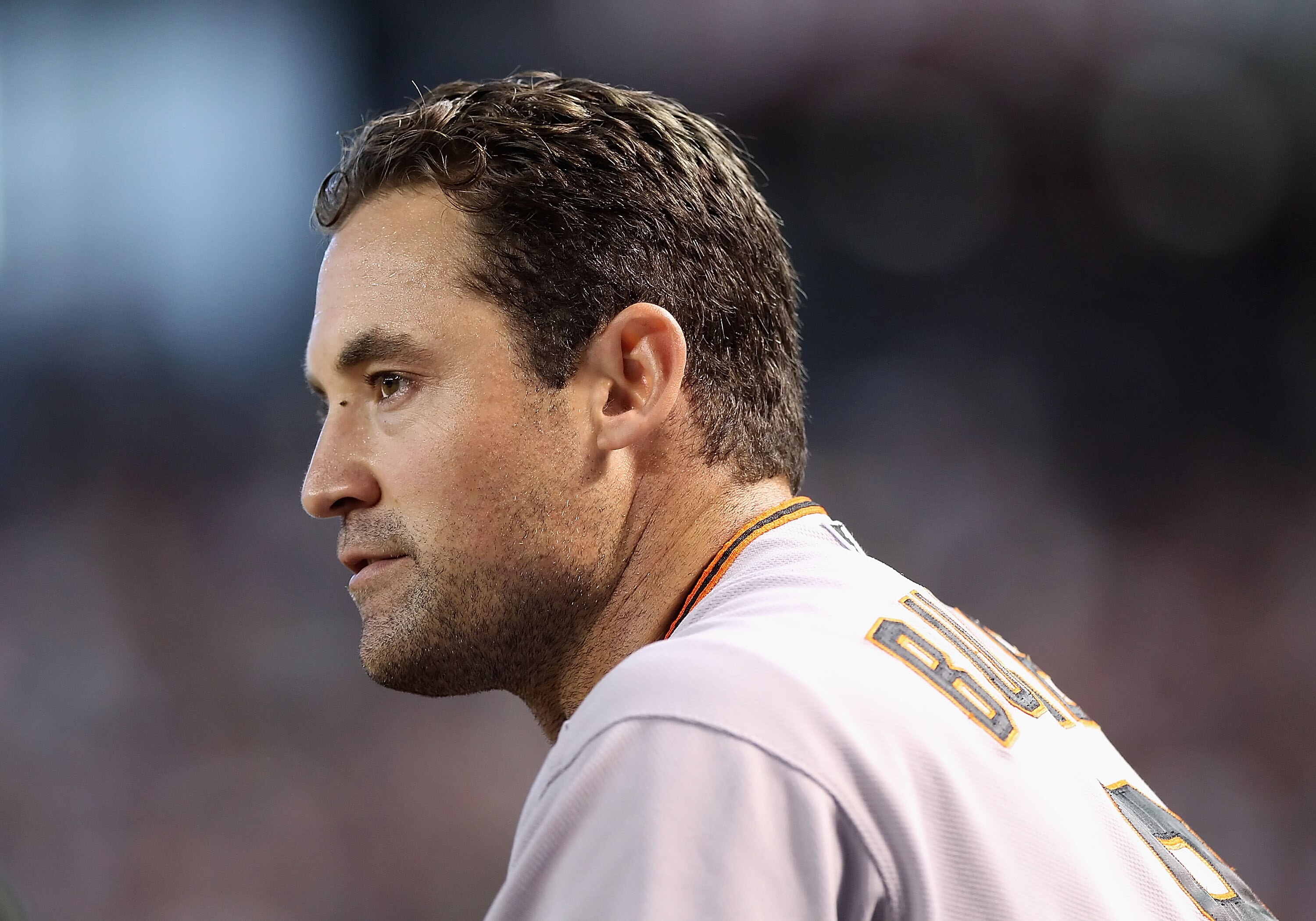 PHOENIX - SEPTEMBER 06:  Pat Burrell #9 of the San Francisco Giants watches from the dugout during the Major League Baseball game against the Arizona Diamondbacks at Chase Field on September 6, 2010 in Phoenix, Arizona. The Giants defeated the Diamondback