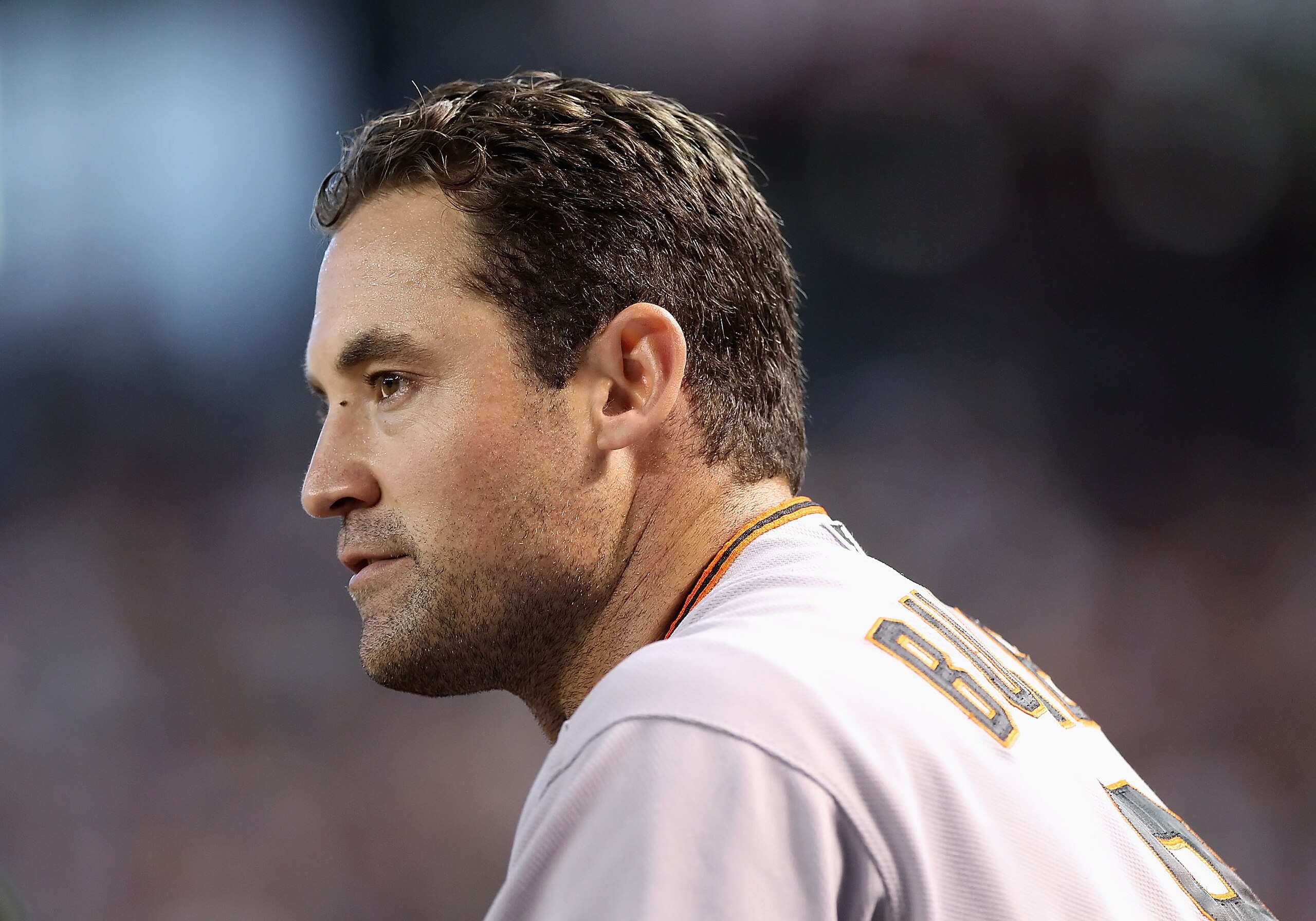 PHOENIX - SEPTEMBER 06:  Pat Burrell #9 of the San Francisco Giants watches from the dugout during the Major League Baseball game against the Arizona Diamondbacks at Chase Field on September 6, 2010 in Phoenix, Arizona. The Giants defeated the Diamondback