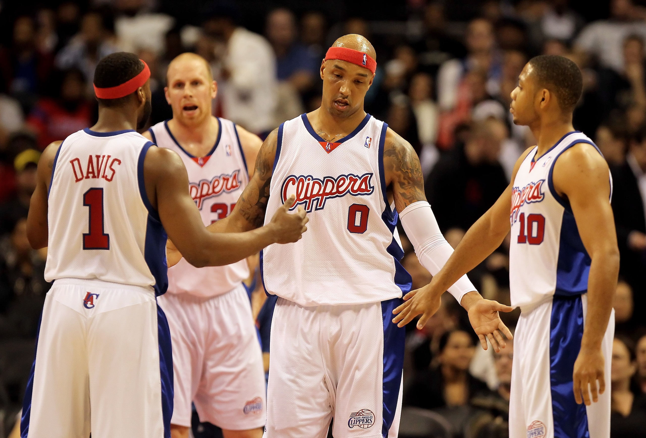 LOS ANGELES, CA - FEBRUARY 24: Drew Gooden #0 of the Los Angeles Clippers is congratulated by Baron Davis (L) #1 and Eric Gordon (R) #10 after scoring a basket against the Detroit Pistons during the first half at Staples Center on February 24, 2010 in Lo LOS ANGELES, CA - FEBRUARY 24: Drew Gooden #0 of the Los Angeles Clippers is congratulated by Baron Davis (L) #1 and Eric Gordon (R) #10 after scoring a basket against the Detroit Pistons during the first half at Staples Center on February 24, 2010 in Lo