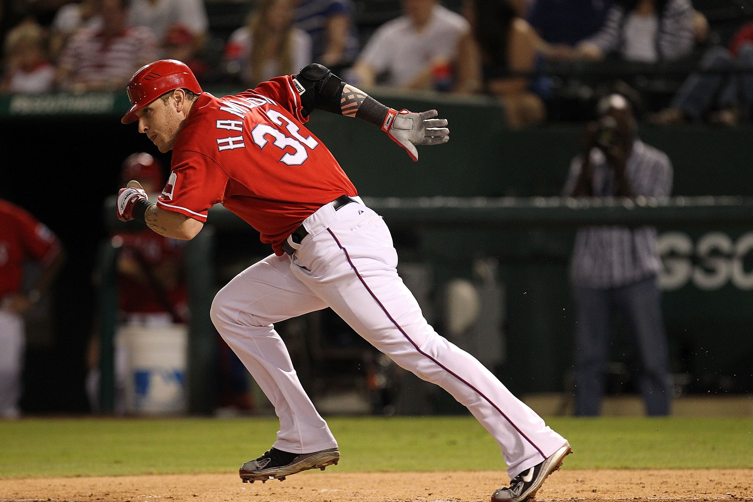 ARLINGTON, TX - OCTOBER 01:  Josh Hamilton #32 of the Texas Rangers runs on a ground out against Los Angeles Angels of Anaheim at Rangers Ballpark in Arlington on October 1, 2010 in Arlington, Texas.  (Photo by Ronald Martinez/Getty Images)