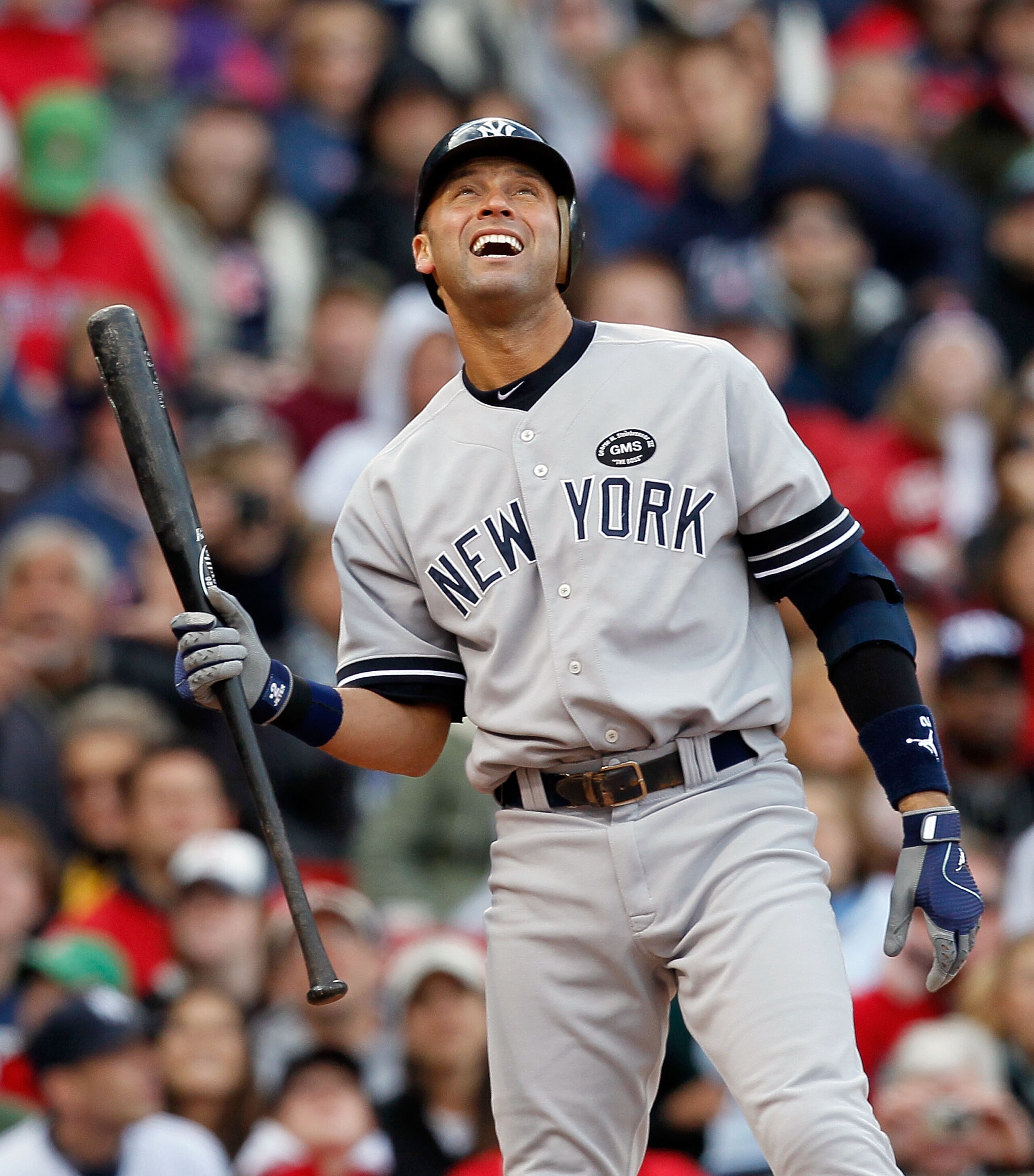 BOSTON - OCTOBER 3:  Derek Jeter #2 of the New York Yankees watches a the flight a foul ball during a game against the Boston Red Sox at Fenway Park, October 3, 2010, in Boston, Massachusetts. (Photo by Jim Rogash/Getty Images)
