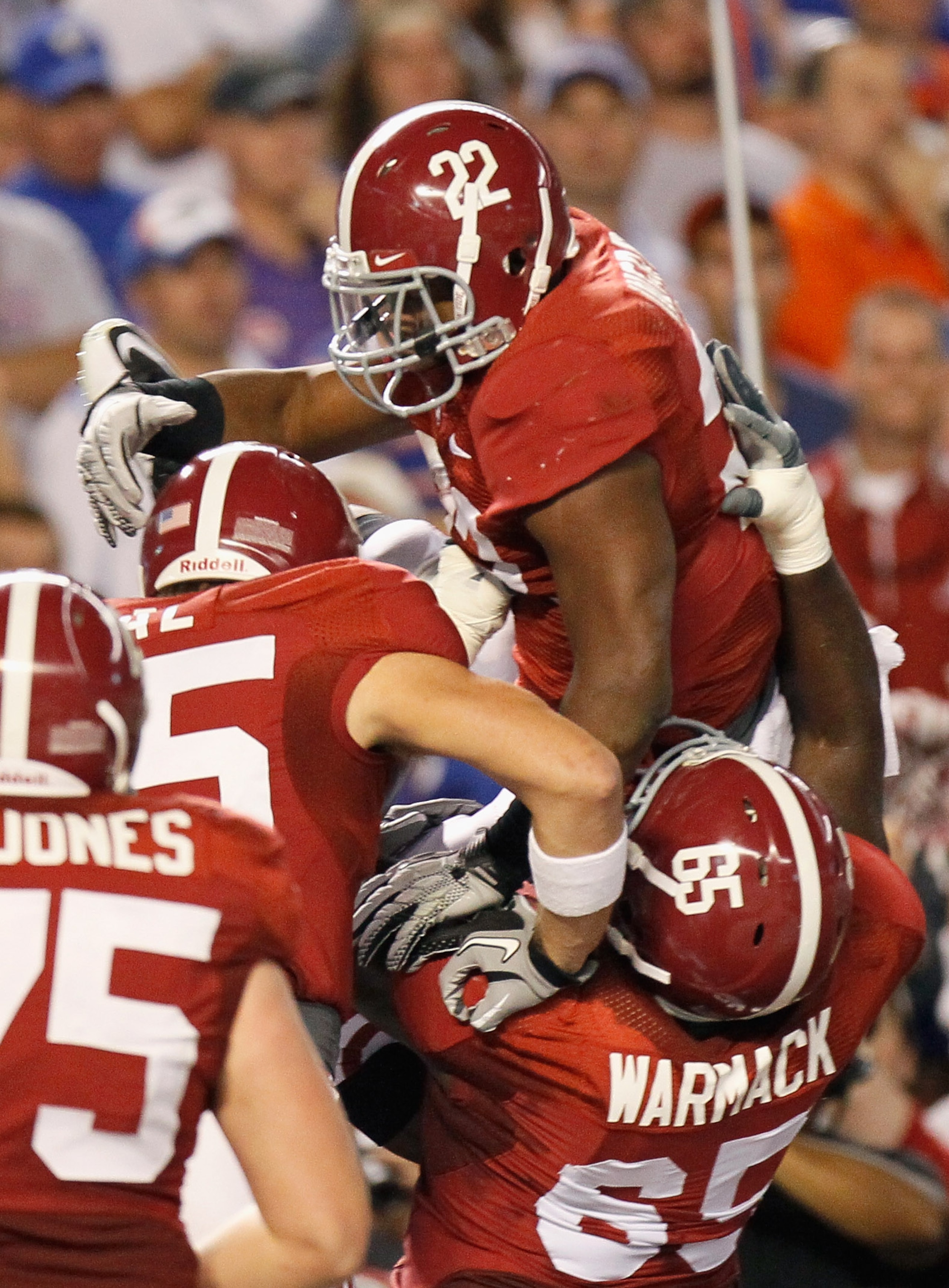 TUSCALOOSA, AL - OCTOBER 02:  Mark Ingram #22 of the Alabama Crimson Tide celebrates his touchdown against the Florida Gators with Preston Dial #85 and Chance Warmack #65 at Bryant-Denny Stadium on October 2, 2010 in Tuscaloosa, Alabama.  (Photo by Kevin