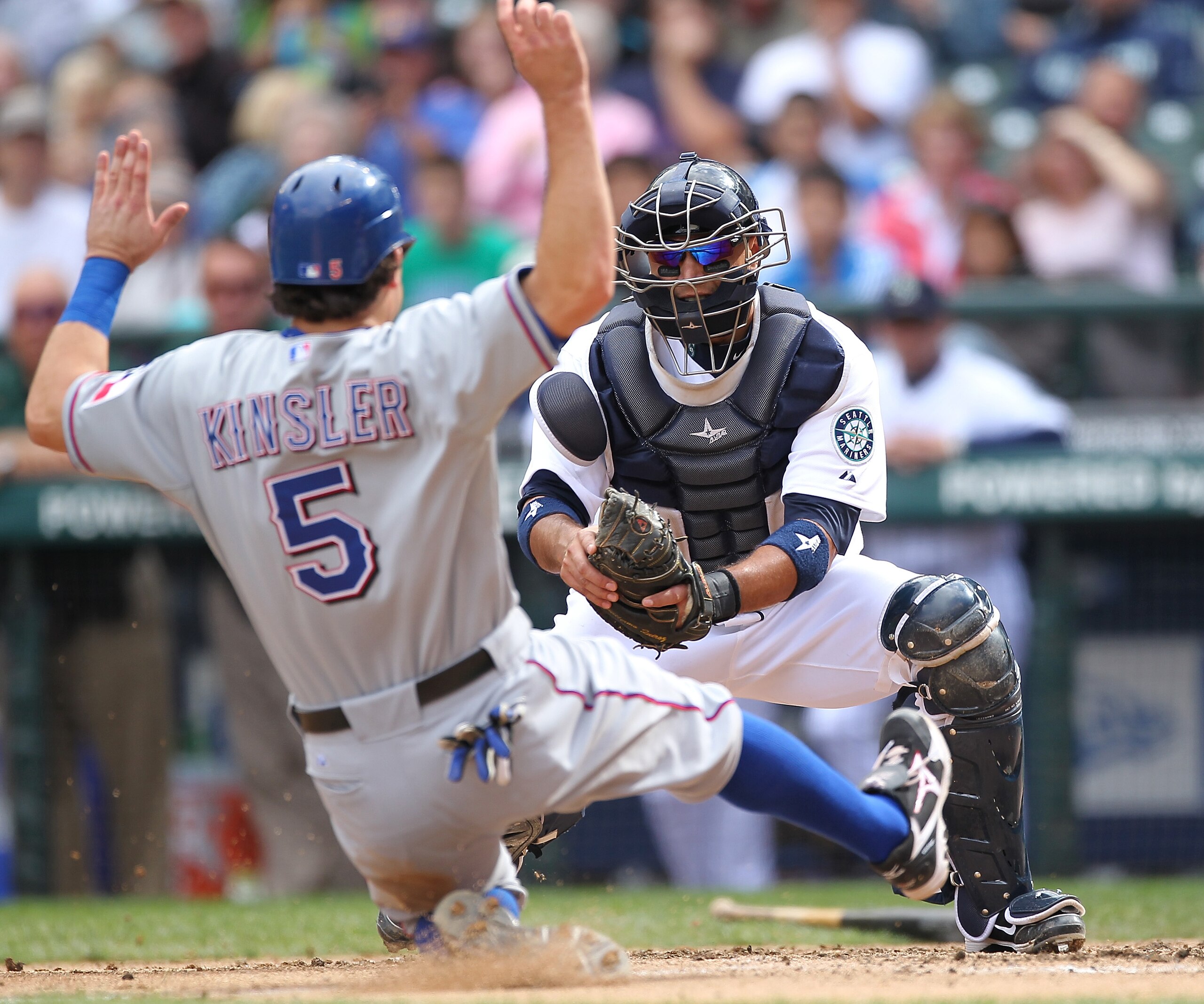 SEATTLE - SEPTEMBER 19:  Catcher Guillermo Quiroz #40 of the Seattle Mariners waits to tag out Ian Kinsler #5 of the Texas Rangers at Safeco Field on September 19, 2010 in Seattle, Washington. (Photo by Otto Greule Jr/Getty Images)