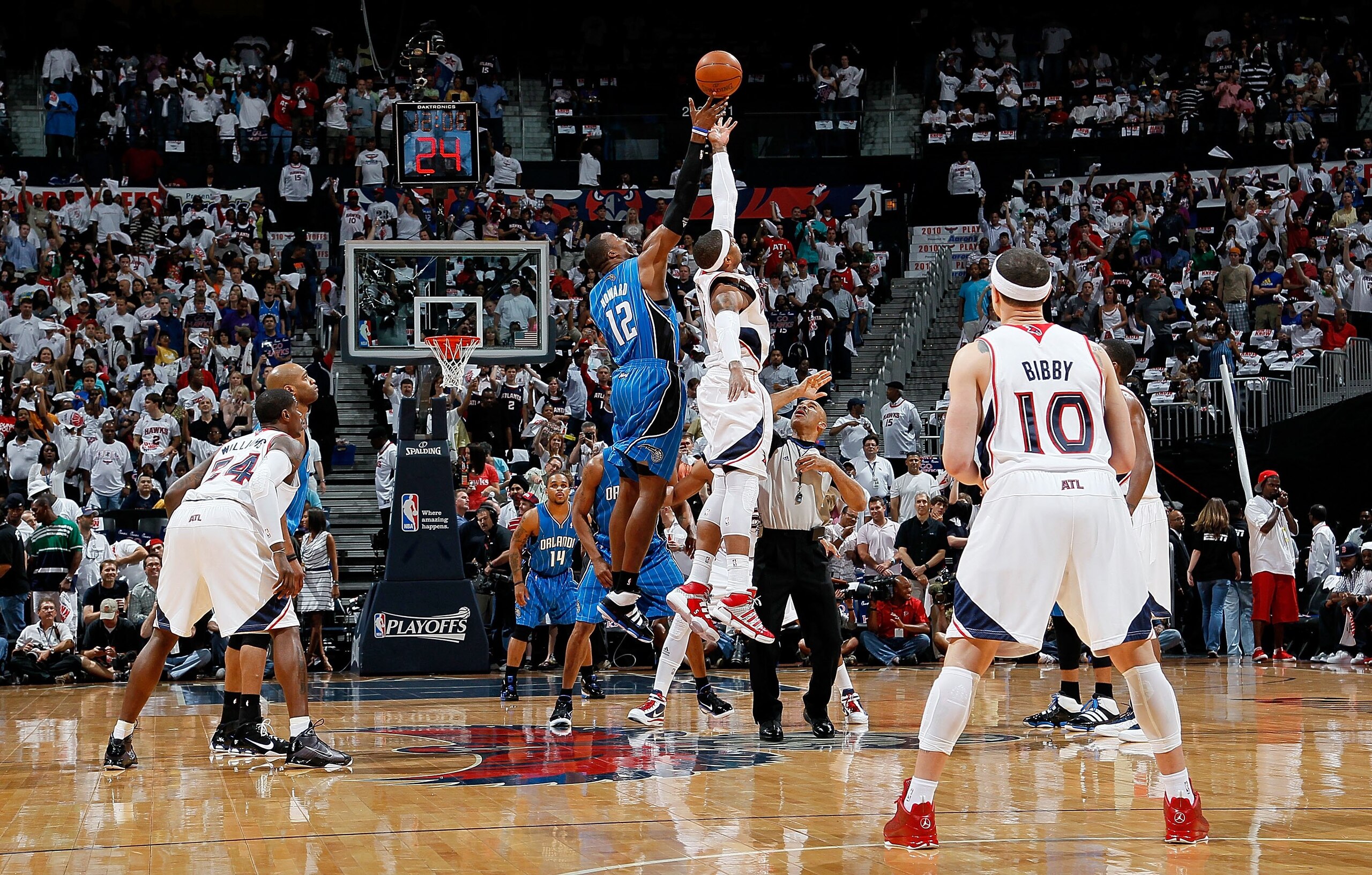 ATLANTA - MAY 08:  Dwight Howard #12 of the Orlando Magic jumps for the opening tipoff against Josh Smith #5 of the Atlanta Hawks during Game Three of the Eastern Conference Semifinals during the 2010 NBA Playoffs at Philips Arena on May 8, 2010 in Atlant