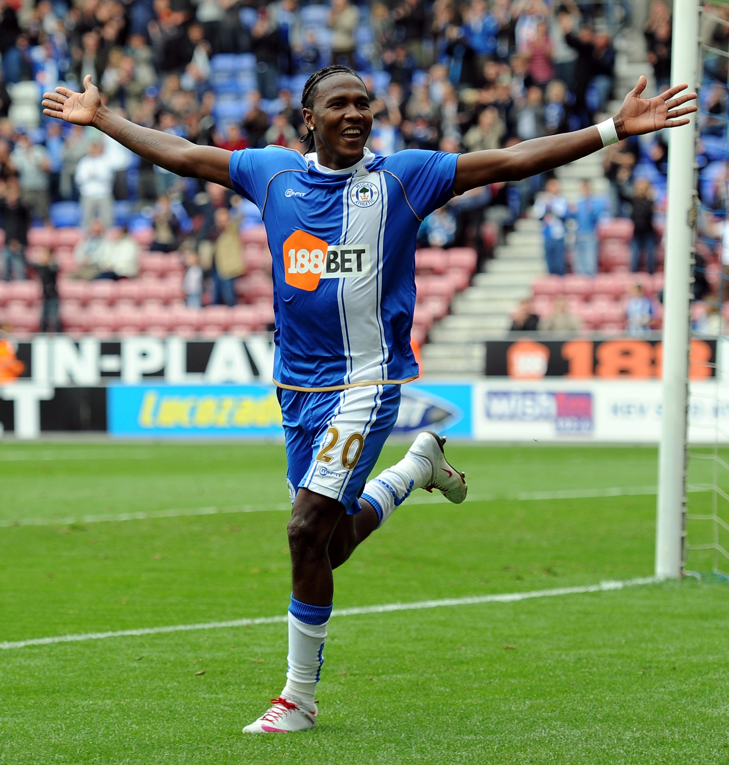 WIGAN, ENGLAND - OCTOBER 02: Hugo Rodallega of Wigan Athletic celebrates scoring his side's second goal during the Barclays Premier League match between Wigan Athletic and Wolverhampton Wanderers at DW Stadium on October 2, 2010 in Wigan, England.  (Photo