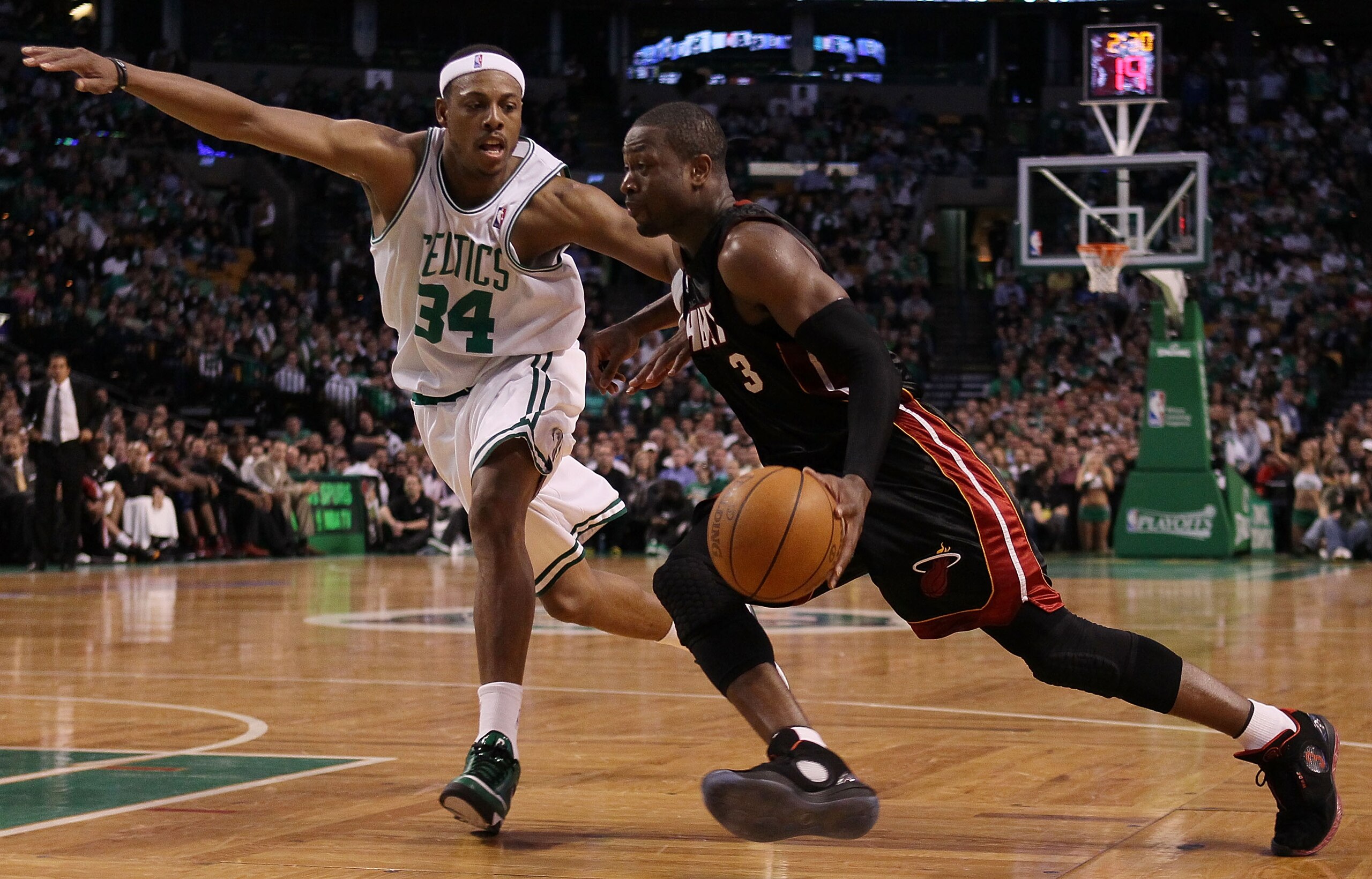 BOSTON - APRIL 27:  Dwyane Wade #3 of the Miami Heat heads for the net as Paul Pierce #34 of the Boston Celtics defends during Game Five of the Eastern Conference Quarterfinals of the 2010 NBA playoffs at the TD Garden on April 27, 2010 in Boston, Massach