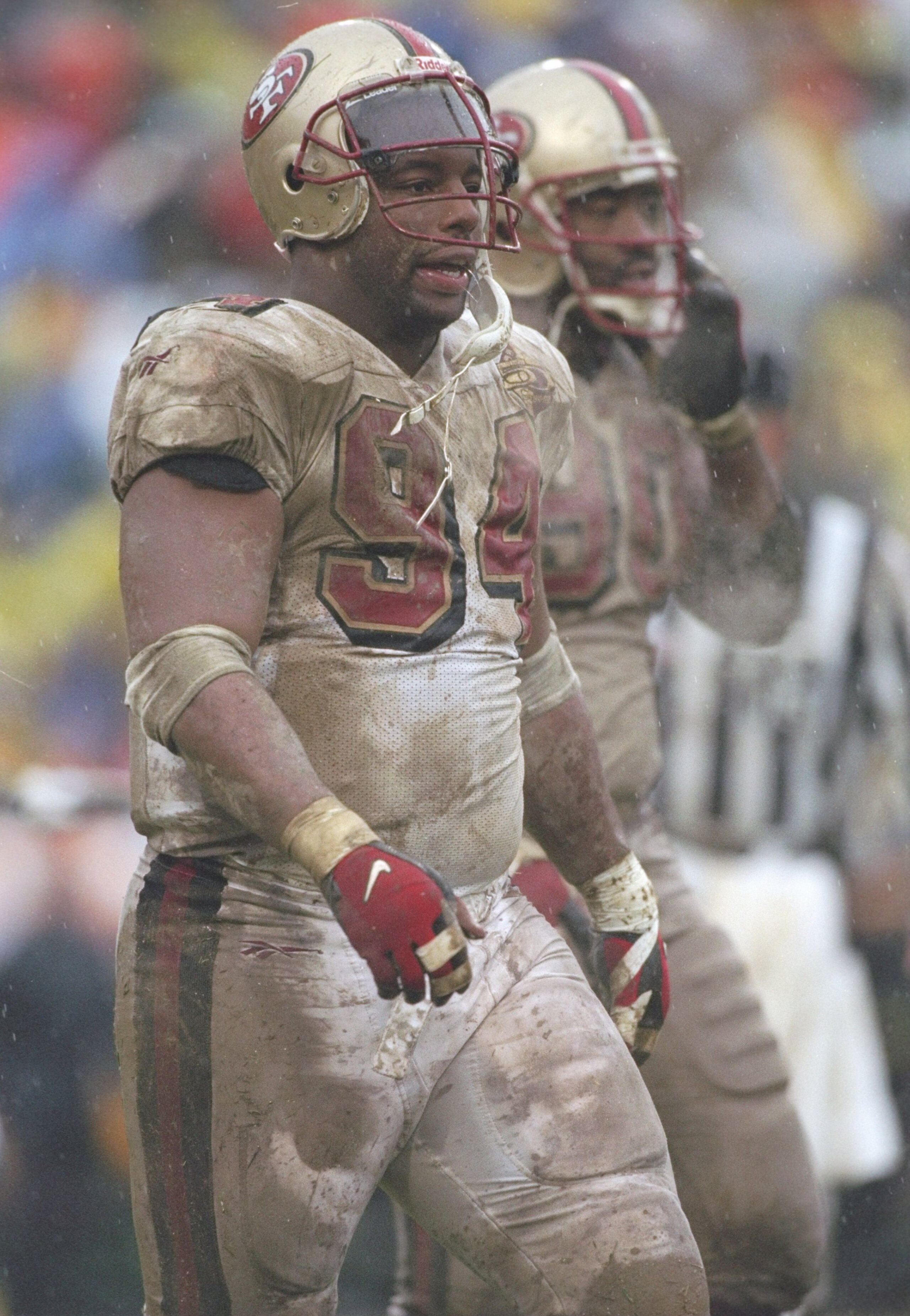 4 Jan 1997:  Defensive tackle Dana Stubblefield of the San Francisco 49ers stands on the sidelines during a playoff game against the Green Bay Packers at Lambeau Field in Green Bay, Wisconsin.  The Packers won the game 35-14. Mandatory Credit: Jonathan Da