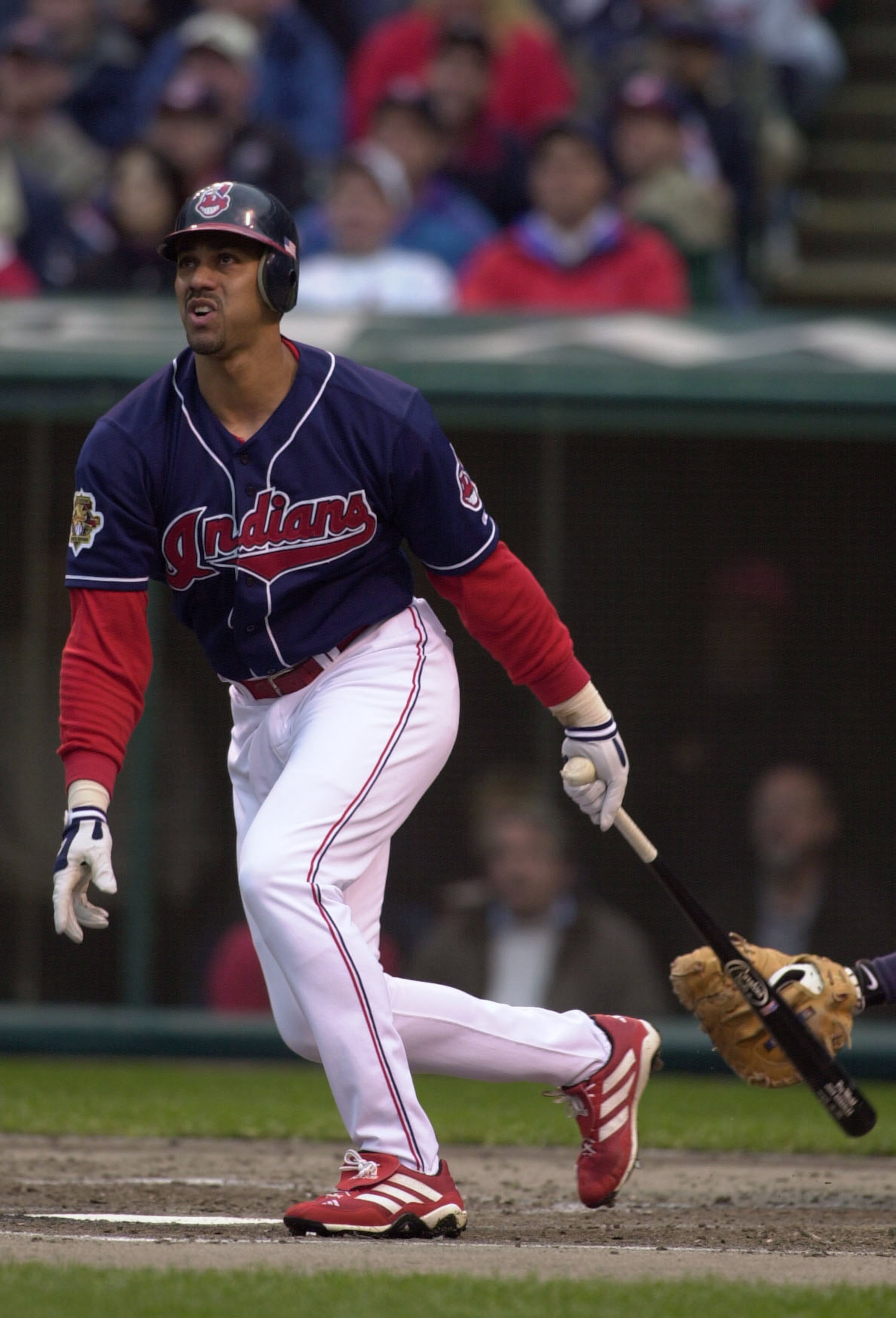 Juan Gonzalez #22 of the Cleveland Indians hits a solo hopme run in the second inning against the Seattle Mariners during game four of the American League Division Series at Jacobs Field in Cleveland, Ohio, October 14, 2001. DIGITAL IMAGE  Mandatory Credi