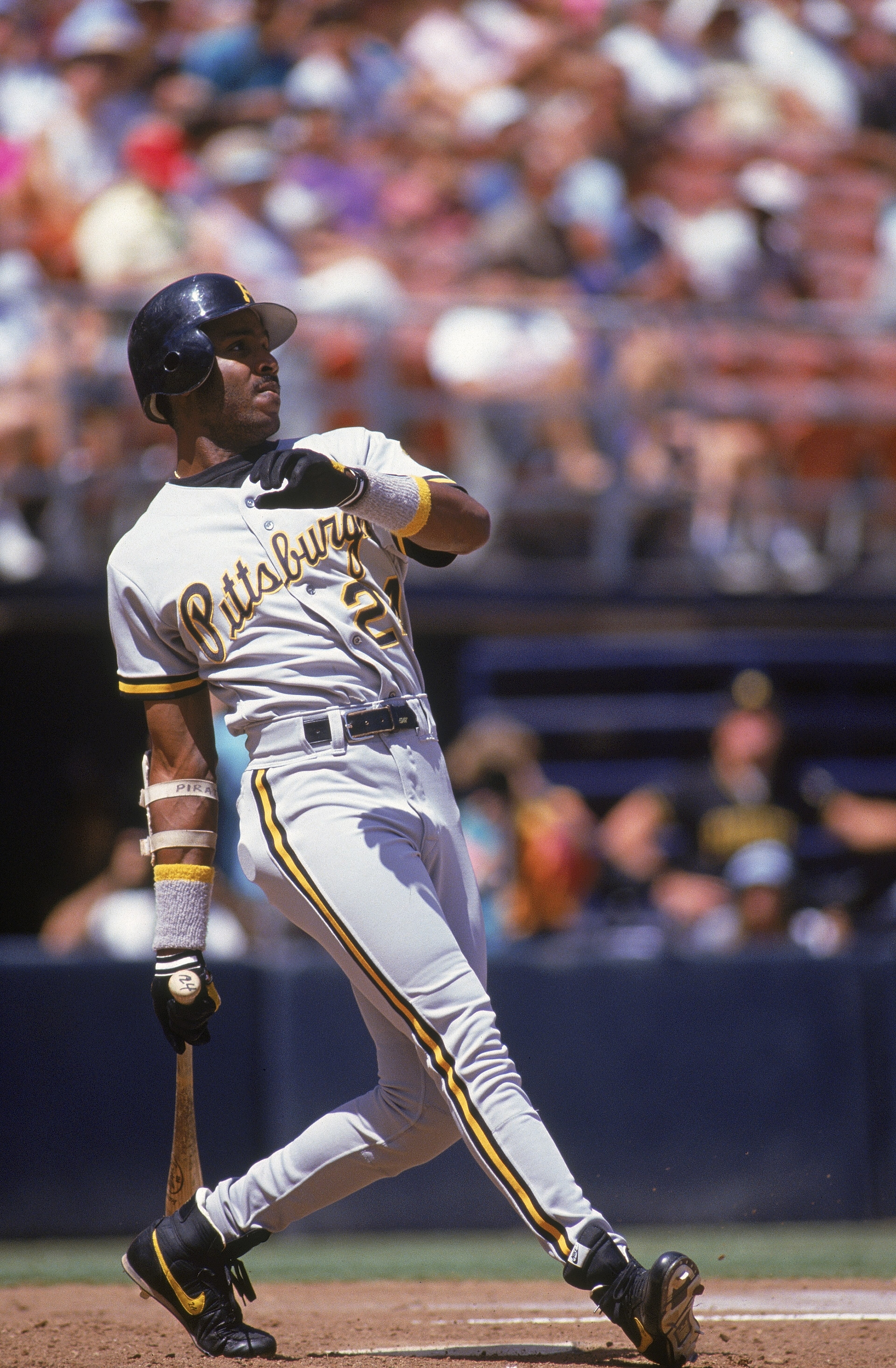 SAN DIEGO - AUGUST 30: Barry Bonds #24  of the Pittsburgh Pirates watches the flight of his hit against the San Diego Padres on August 30, 1992 at Jack Murphy Stadium in San Diego, California. Barry Bonds made his 165 career home run during this game. Bar