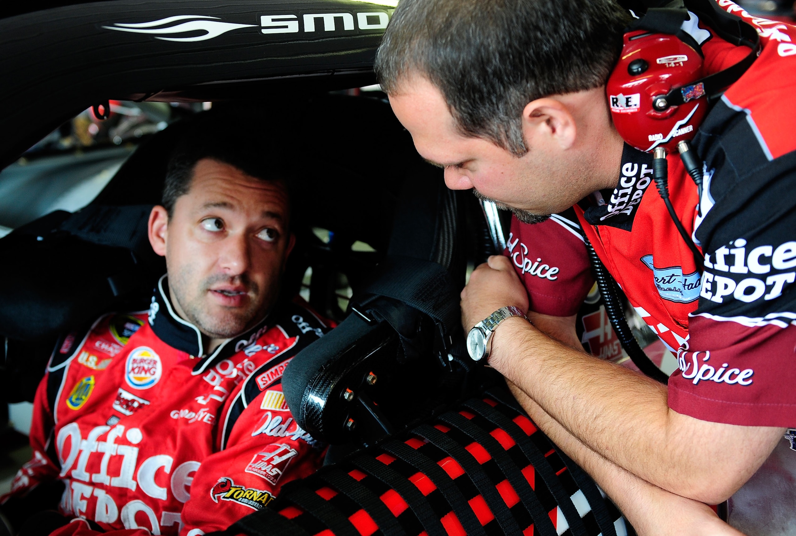 LONG POND, PA - JULY 30:  Tony Stewart (L), driver of the #14 Office Depot/Old Spice Chevrolet, talks with crew chief Darian Grubb in the garage during practice for the NASCAR Sprint Cup Series Sunoco Red Cross Pennsylvania 500 at Pocono Raceway on July 3