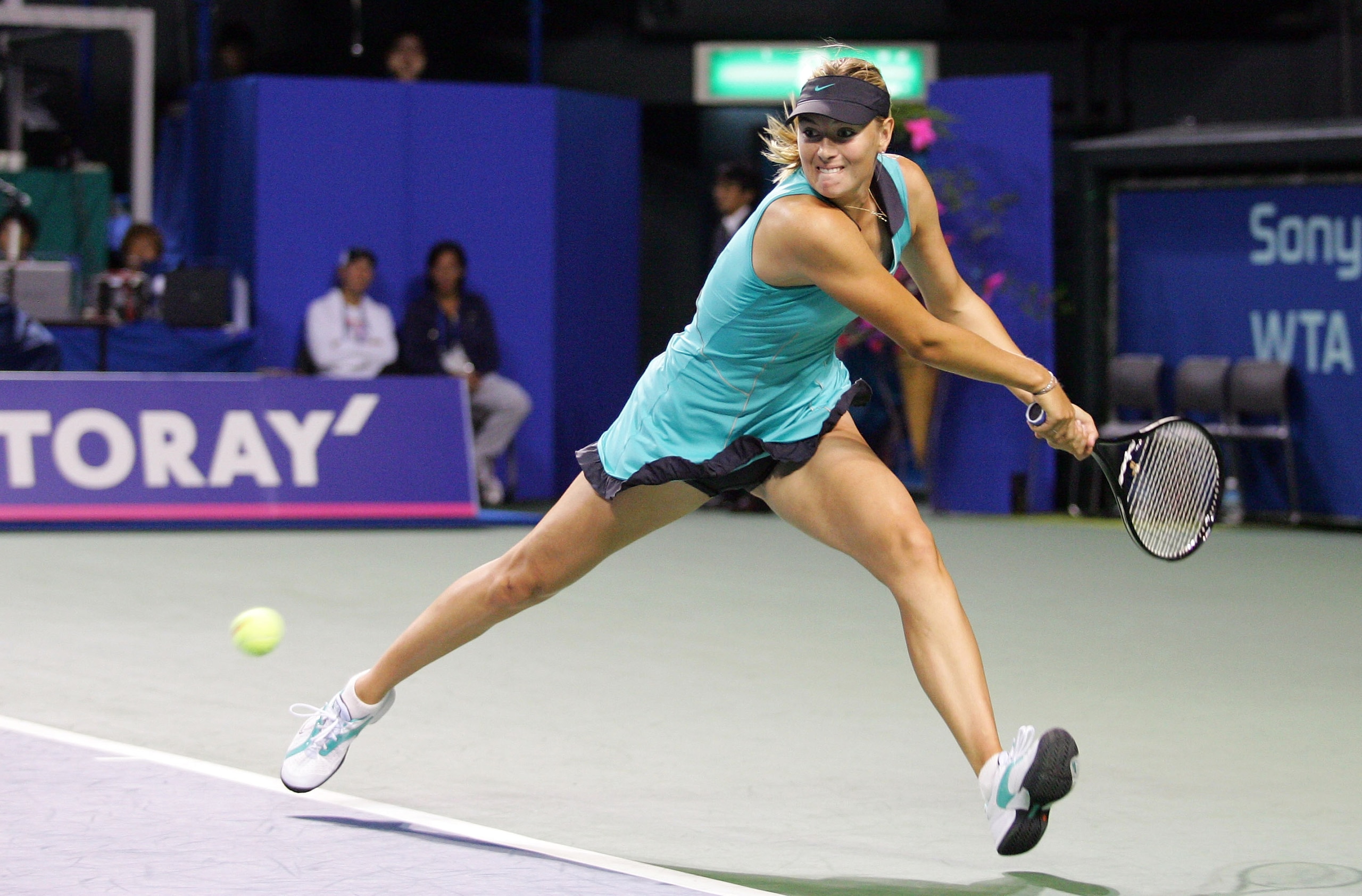 TOKYO - SEPTEMBER 27: Maria Sharapova of Russia backhands in her match against Kimiko Date Krumm of Japan on day two of the Toray Pan Pacific Open at Ariake Colosseum on September 27, 2010 in Tokyo, Japan. (Photo by Koji Watanabe/Getty Images)