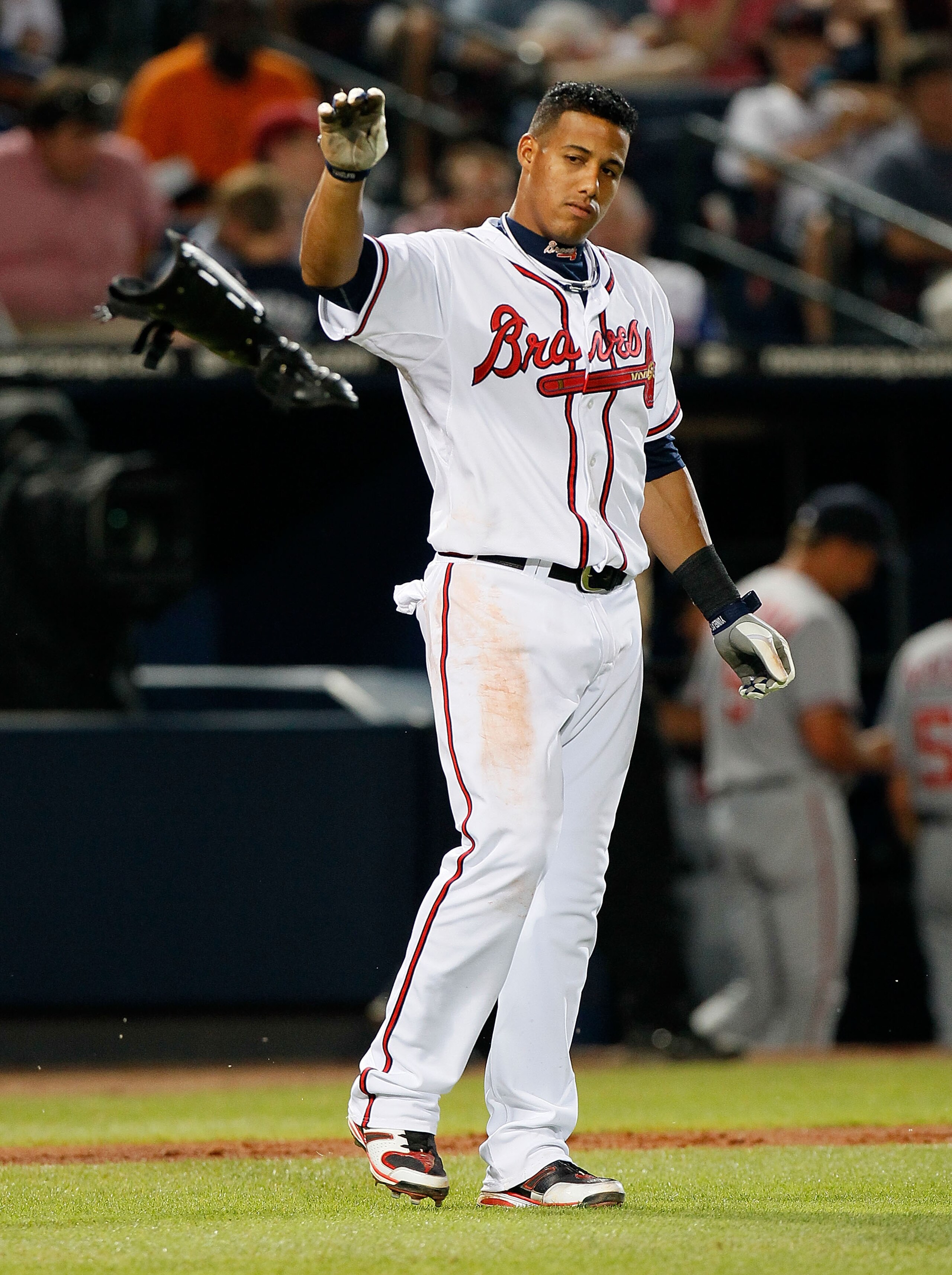 ATLANTA - JUNE 30:  Yunel Escobar #19 of the Atlanta Braves tosses his shin guard after striking out against the Washington Nationals at Turner Field on June 30, 2010 in Atlanta, Georgia.  (Photo by Kevin C. Cox/Getty Images)