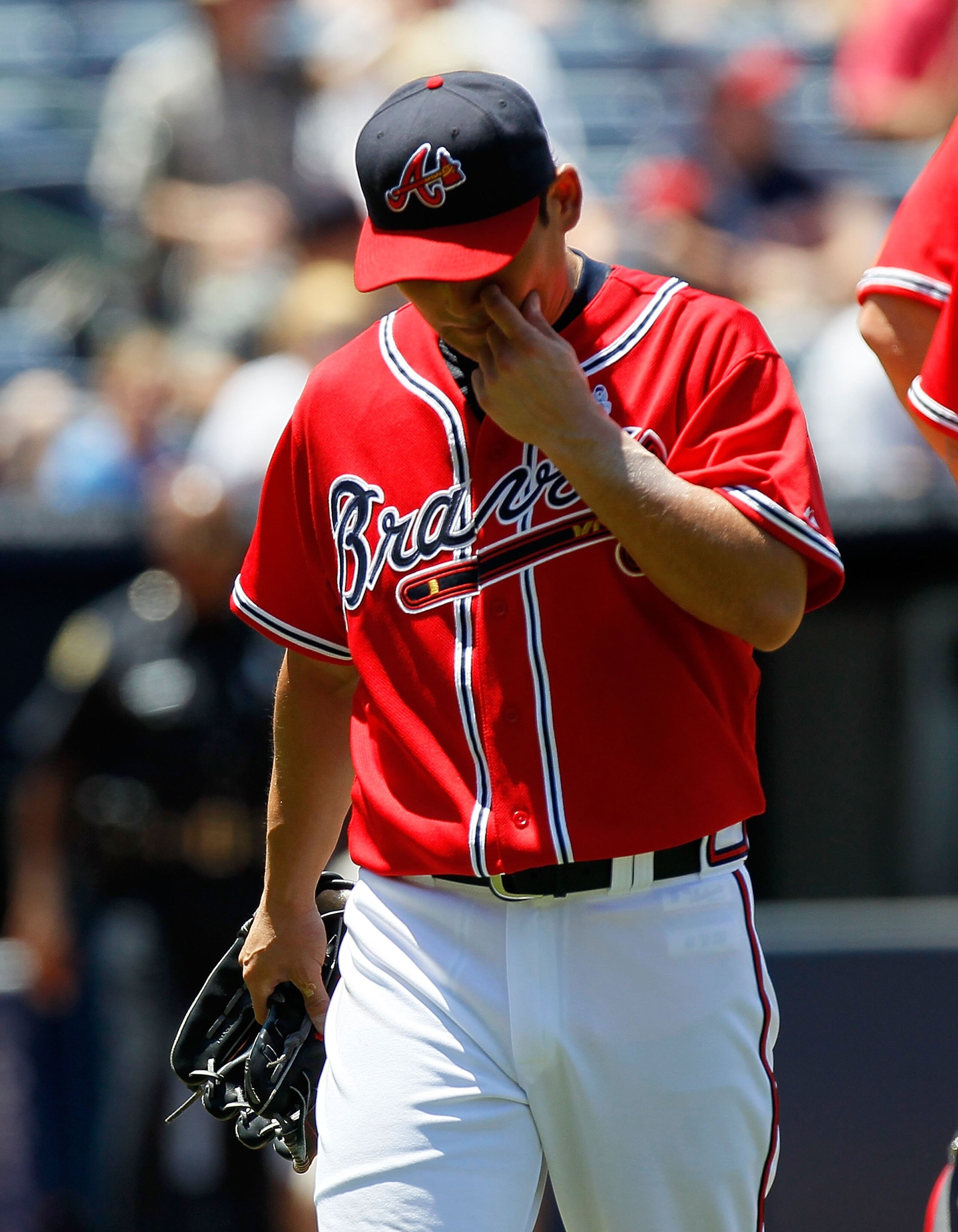 ATLANTA - JUNE 20:  Starting pitcher Kenshin Kawakami #11 of the Atlanta Braves is pulled in the third inning against the Kansas City Royals at Turner Field on June 20, 2010 in Atlanta, Georgia.  (Photo by Kevin C. Cox/Getty Images)