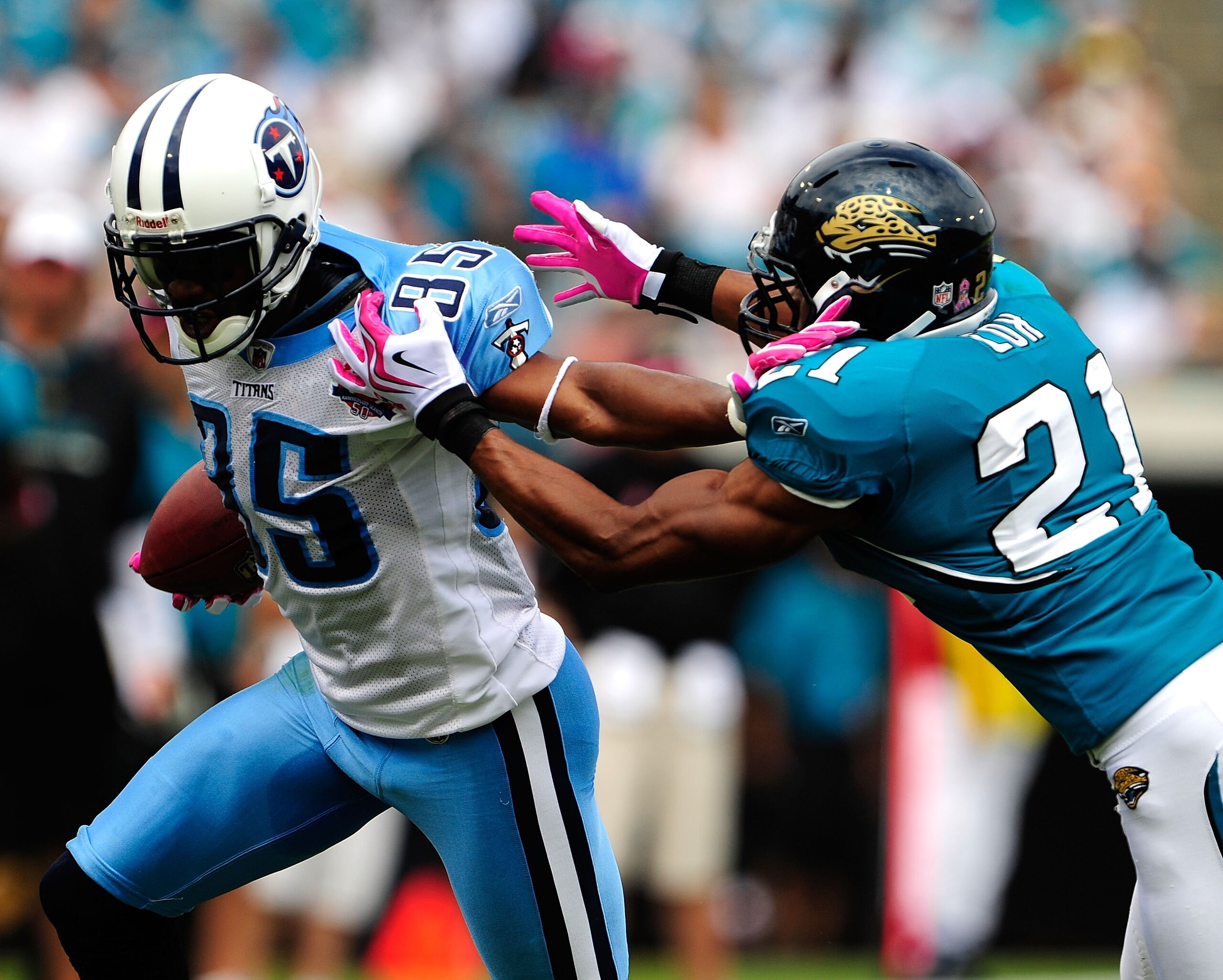 JACKSONVILLE, FL - OCTOBER 04: Nate Washington #85 of the Tennessee Titans is tackled by Derek Cox #21 of the Jacksonville Jaguars during the game at Jacksonville Municipal Stadium on October 4, 2009 in Jacksonville, Florida. (Photo by Sam Greenwood/Get JACKSONVILLE, FL - OCTOBER 04: Nate Washington #85 of the Tennessee Titans is tackled by Derek Cox #21 of the Jacksonville Jaguars during the game at Jacksonville Municipal Stadium on October 4, 2009 in Jacksonville, Florida. (Photo by Sam Greenwood/Get