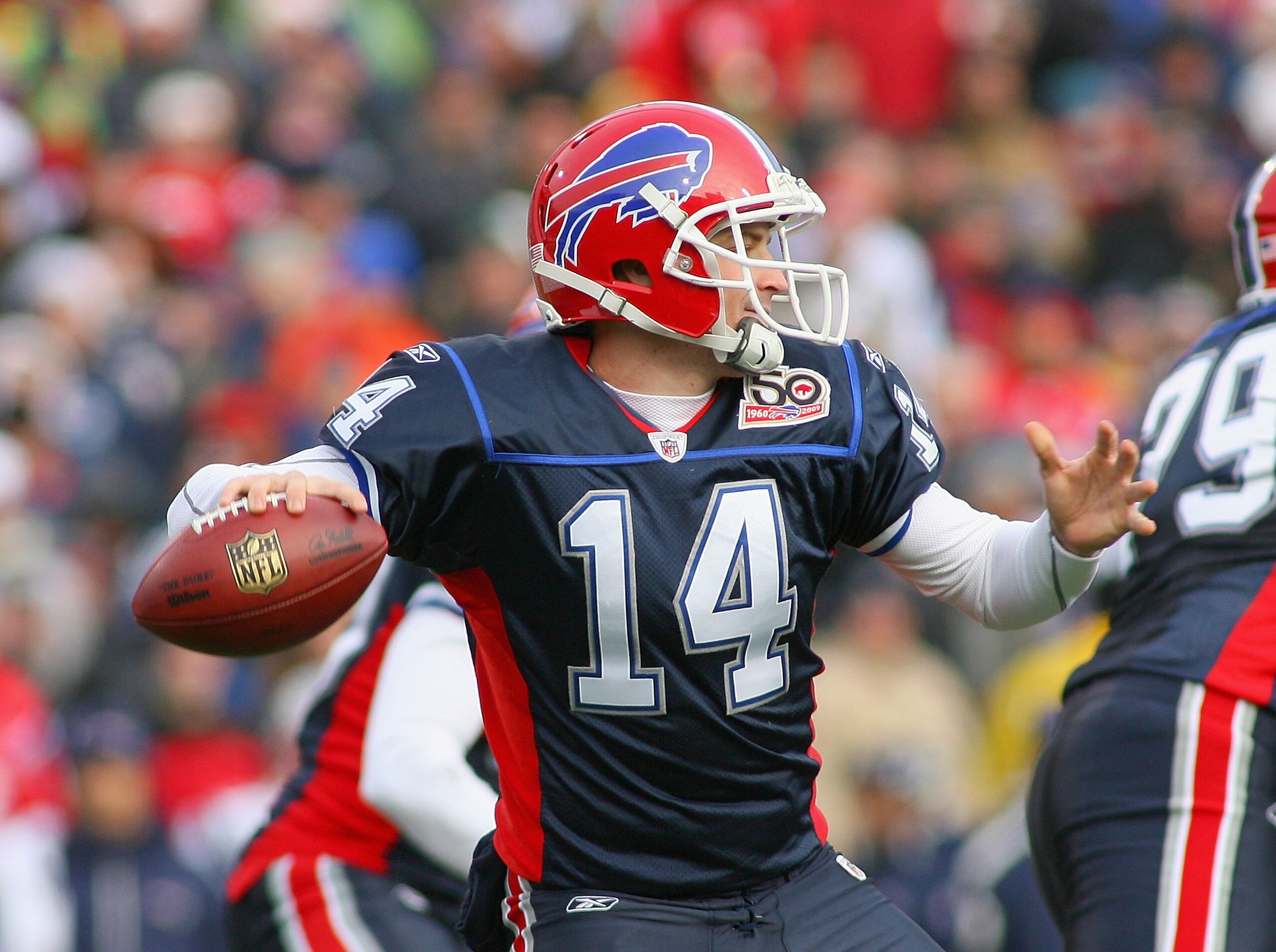 ORCHARD PARK, NY - DECEMBER 20:  Ryan Fitzpatrick #14 of the Buffalo Bills readies to pass against the New England Patriots at Ralph Wilson Stadium on December 20, 2009 in Orchard Park, New York. The Patriots won 17-10.  (Photo by Rick Stewart/Getty Image