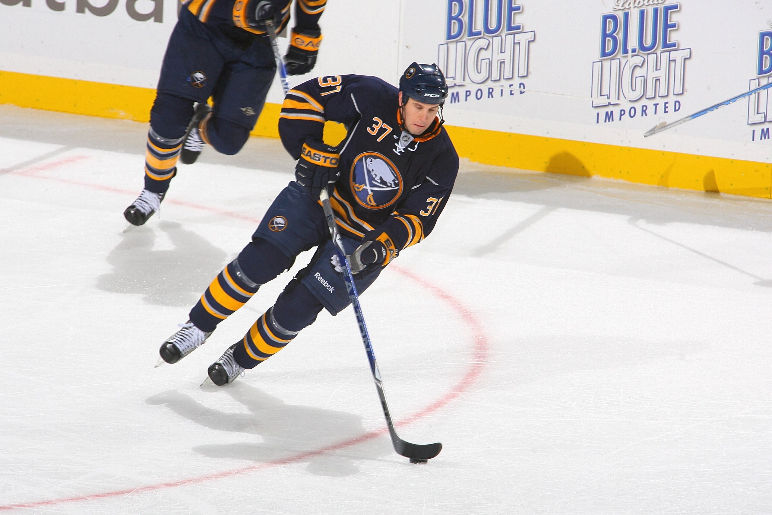 BUFFALO, NY - NOVEMBER 20:  Matt Ellis #37 of the Buffalo Sabres skates with the puck during the game against the Boston Bruins at HSBC Arena  on November 20, 2009 in Buffalo, New York. (Photo by Rick Stewart/Getty Images)