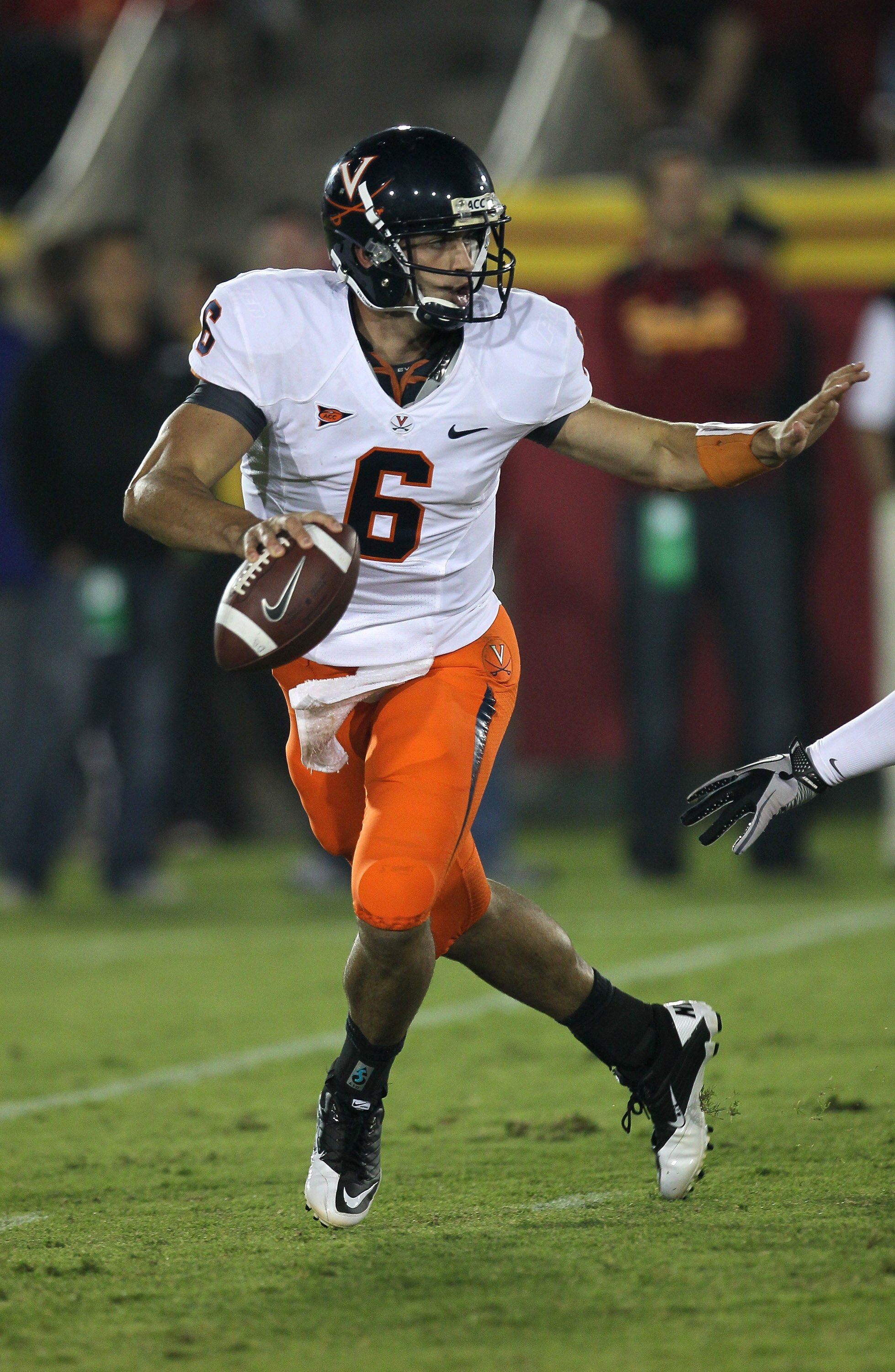 LOS ANGELES, CA - SEPTEMBER 11:  Quarterback Marc Verica #6 of the Virginia Cavaliers drops back to pass against the USC Trojans at Los Angeles Memorial Coliseum on September 11, 2010 in Los Angeles, California. USC won 17-14.  (Photo by Stephen Dunn/Gett